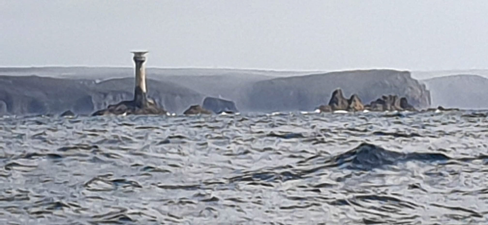 Longships light house and Lands End