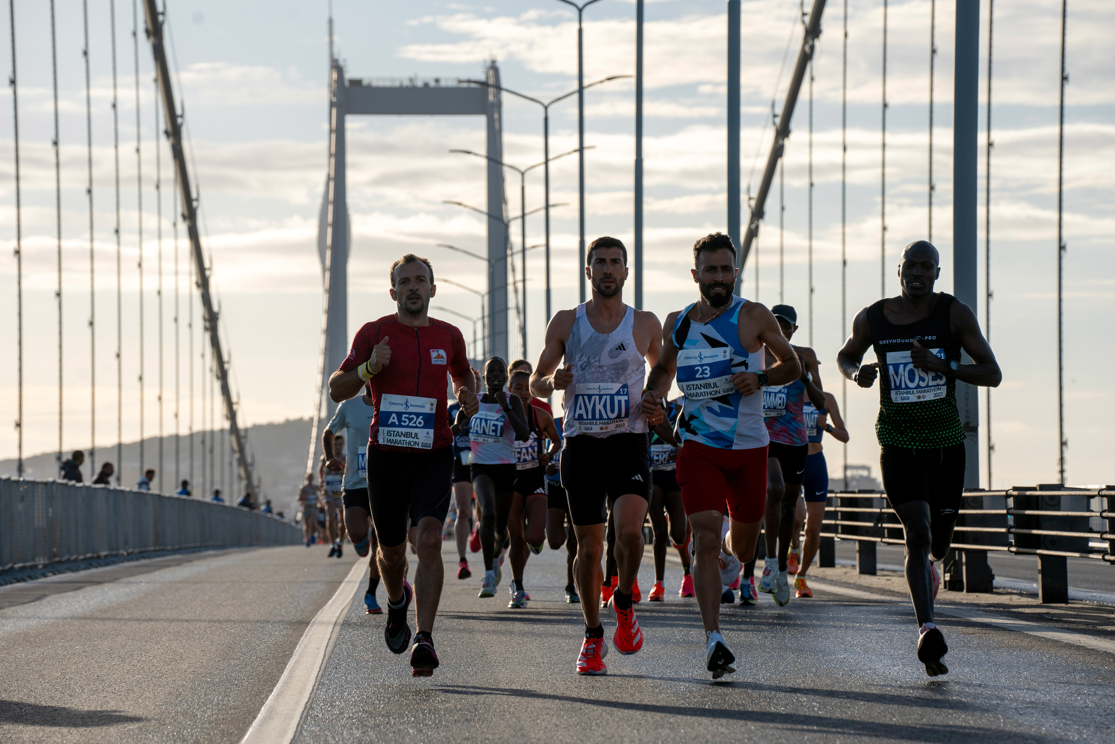Athletes run at the Istanbul Marathon on the 15 July Martyrs Bridge on November 5, 2023. Istanbul Marathon is the only intercontinental marathon held on the 15 July Martyrs Bridge, which connects the European and Asian sides.