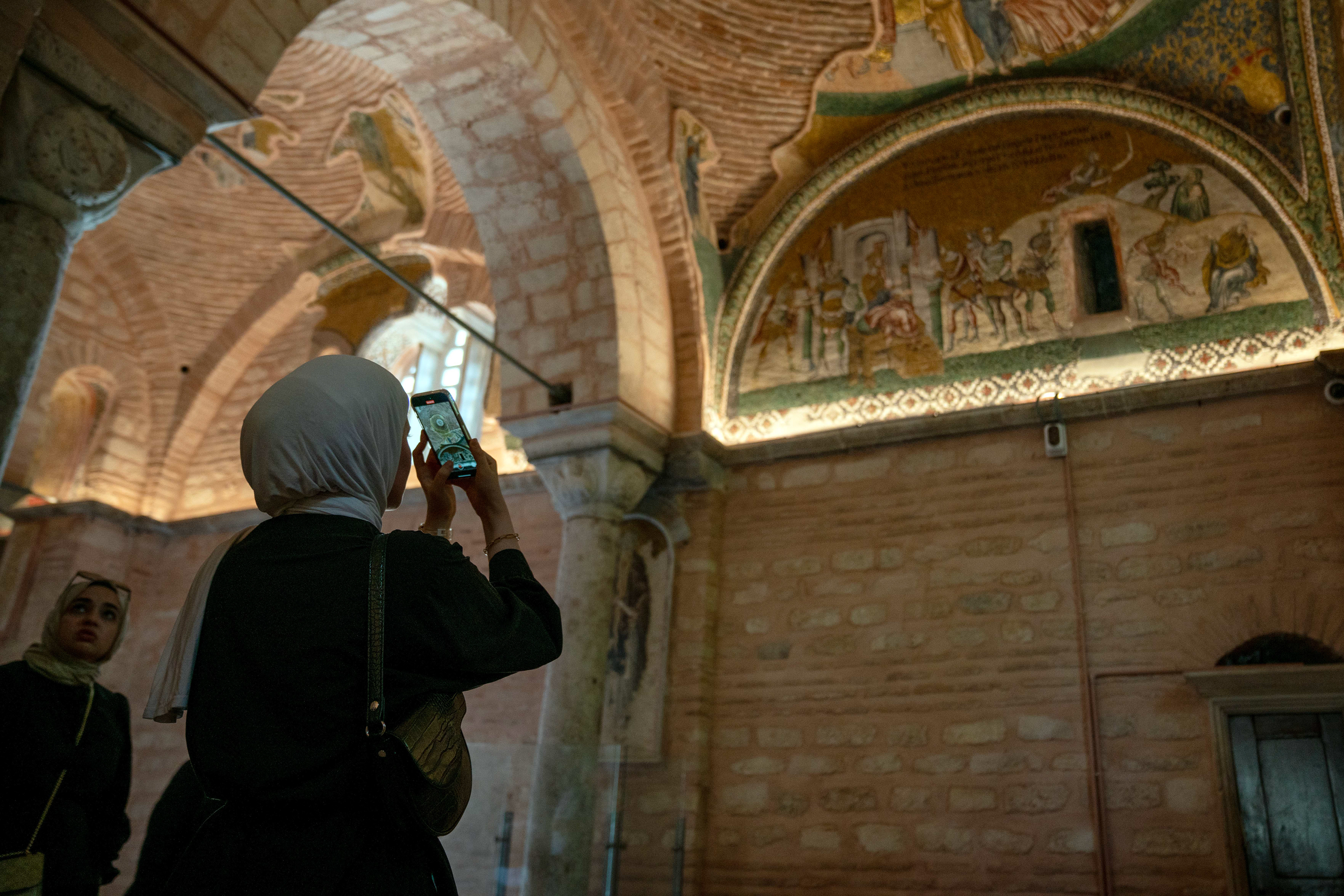 People visit the historic Chora Mosque in Istanbul, which reopened to visitors on May 8, 2024.