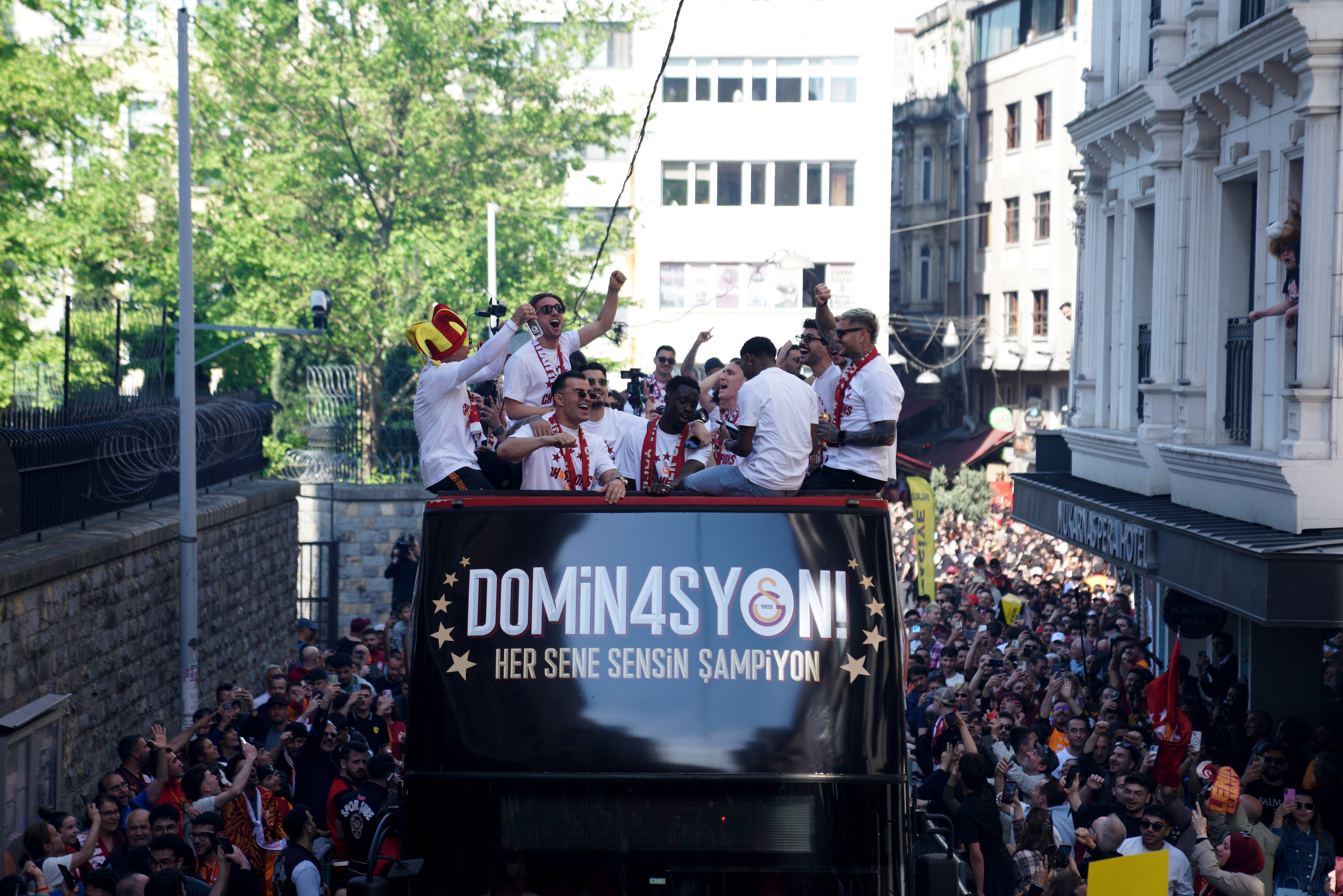 Galatasaray players on the bus parade as they celebrate winning Super Lig in Istanbul on May 15, 2026.