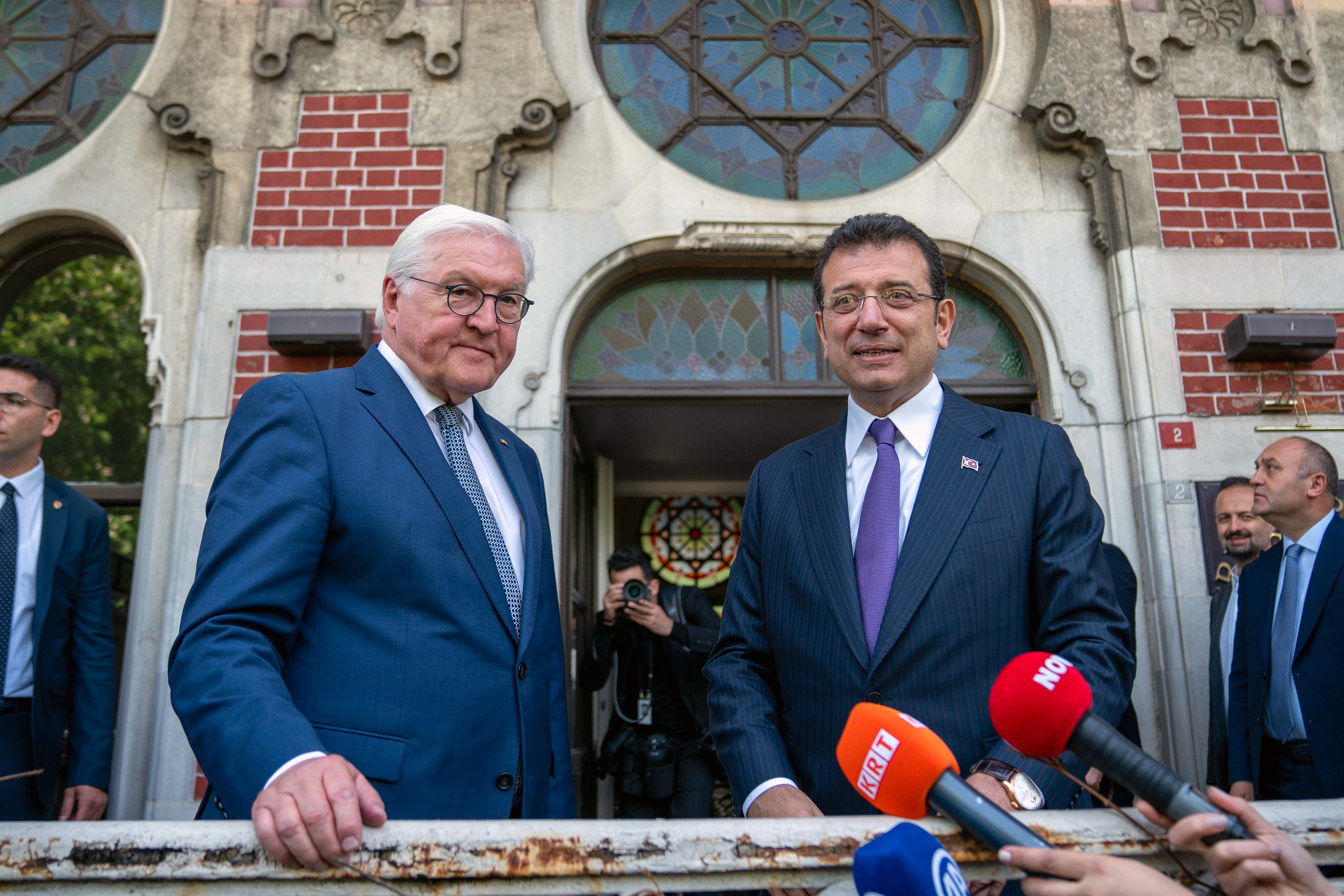 German President Frank-Walter Steinmeier is poses with Istanbul Metropolitan Municipality Mayor Ekrem Imamoglu at the exhibition at Istanbul Sirkeci Train Station. April 22, 2024.