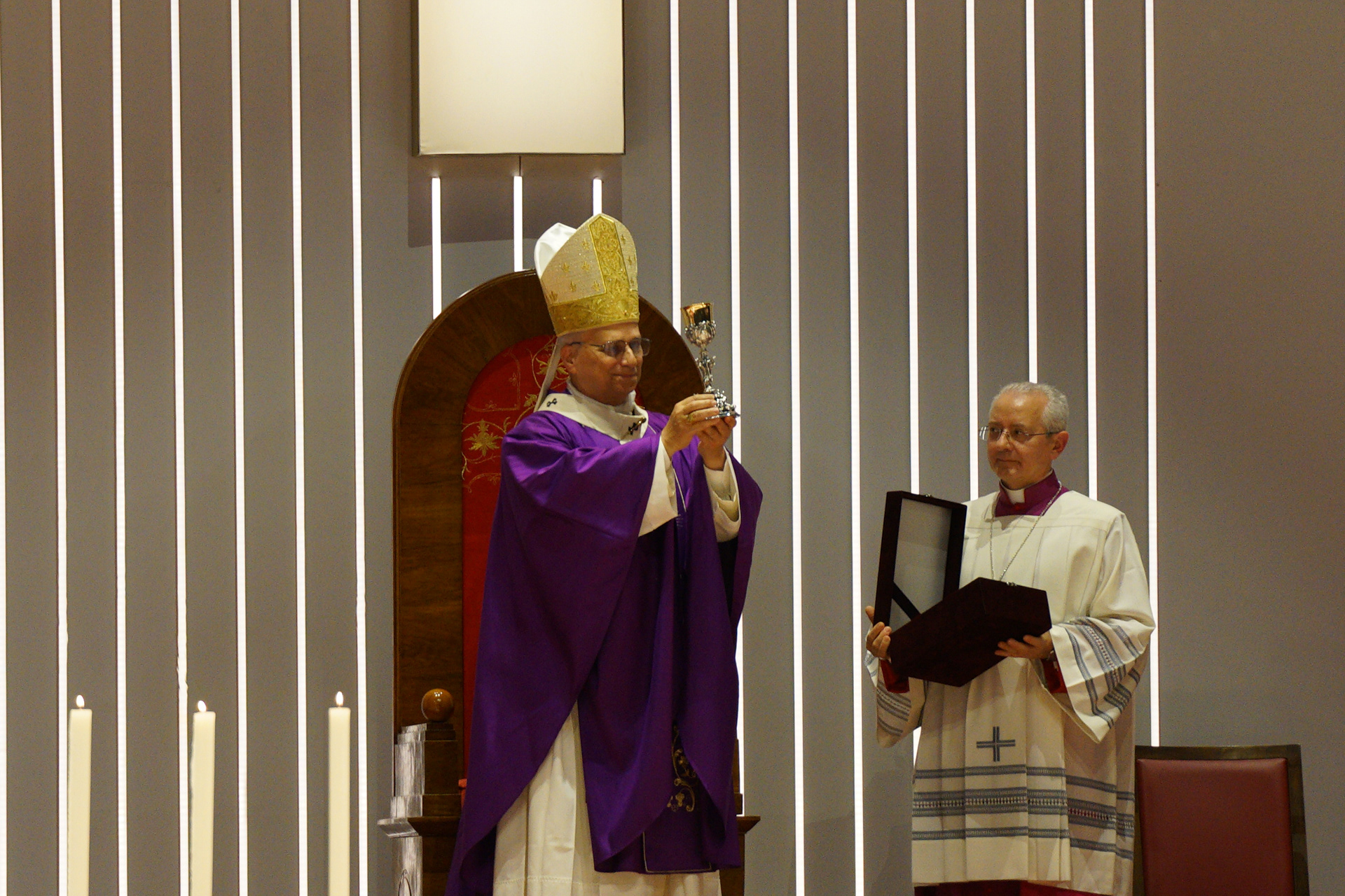 Pope Leo XIV shows a gift he received as celebrates a Mass at the Volkswagen Arena in Istanbul, during his first apostolic journey, on November 29, 2025.