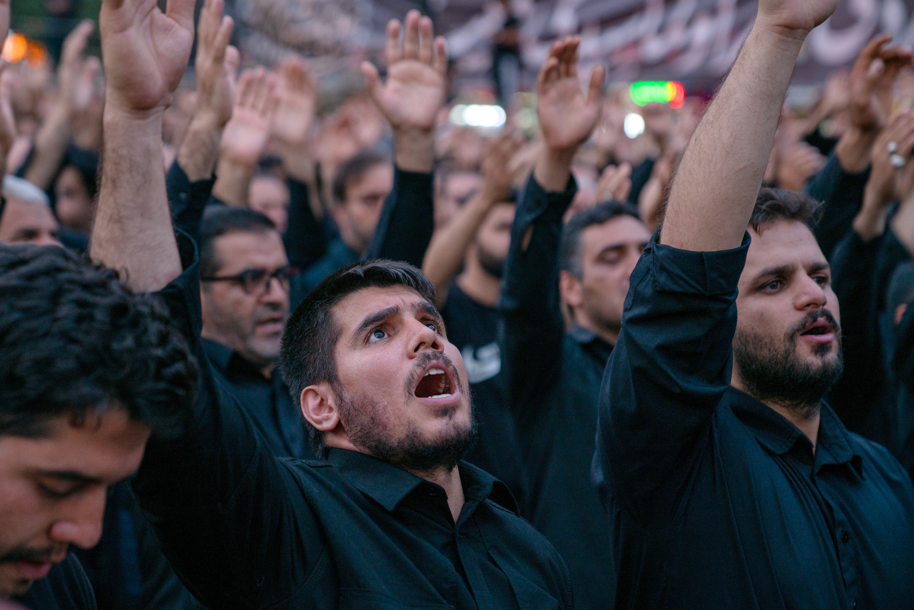 Shiite Muslims in Iran commemorate Imam Hussein by singing hymns in Zanjan Enghelab Square, the day after the Day of Ashura, the 1384th anniversary of Imam Hussein's martyrdom.