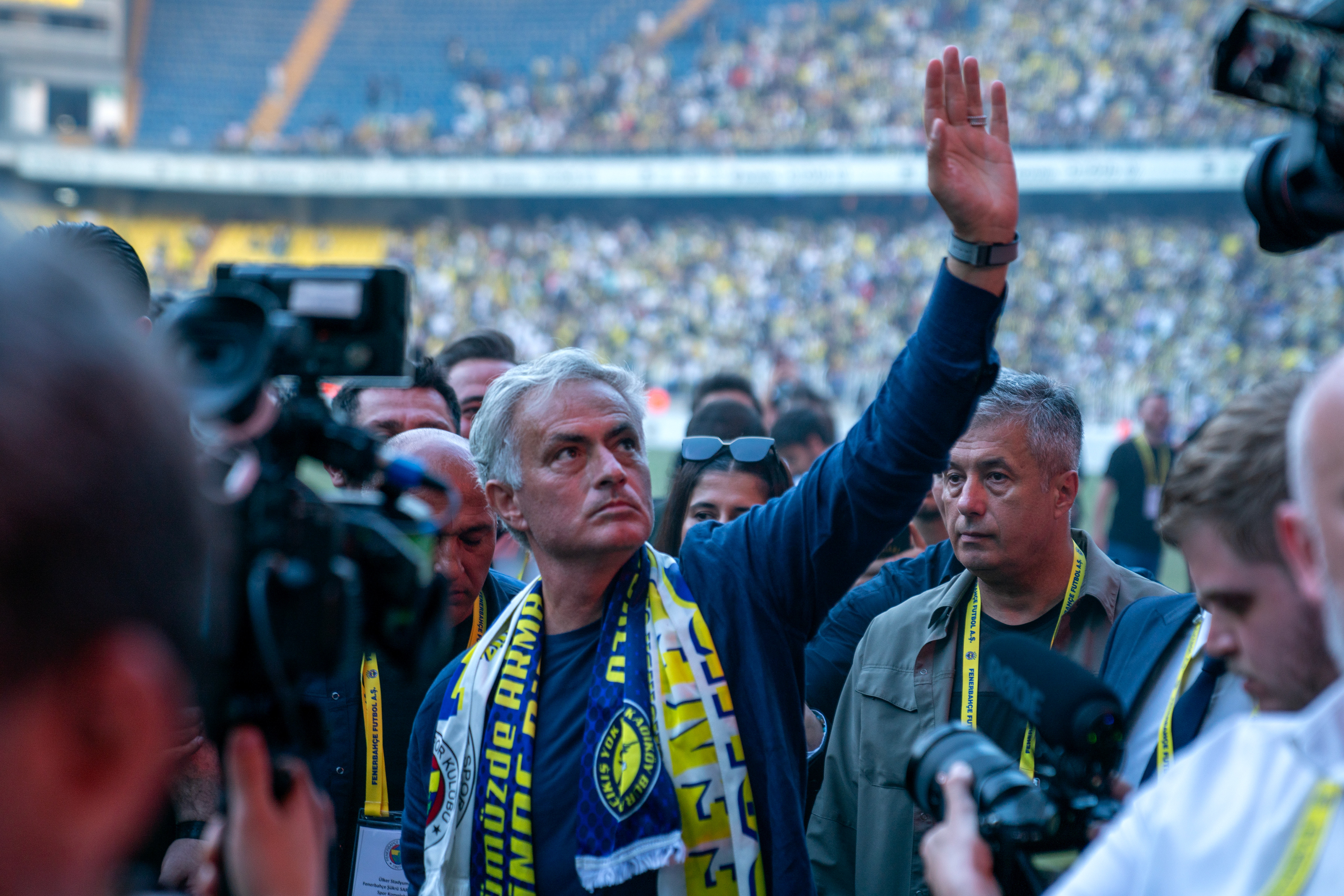 Portuguese coach Jose Mourinho greets the fans during the signing ceremony of the contract he will sign with Fenerbahce at Fenerbahce Sukru Saracoglu Sports Complex at Ulker Stadium on June 2, 2024.
