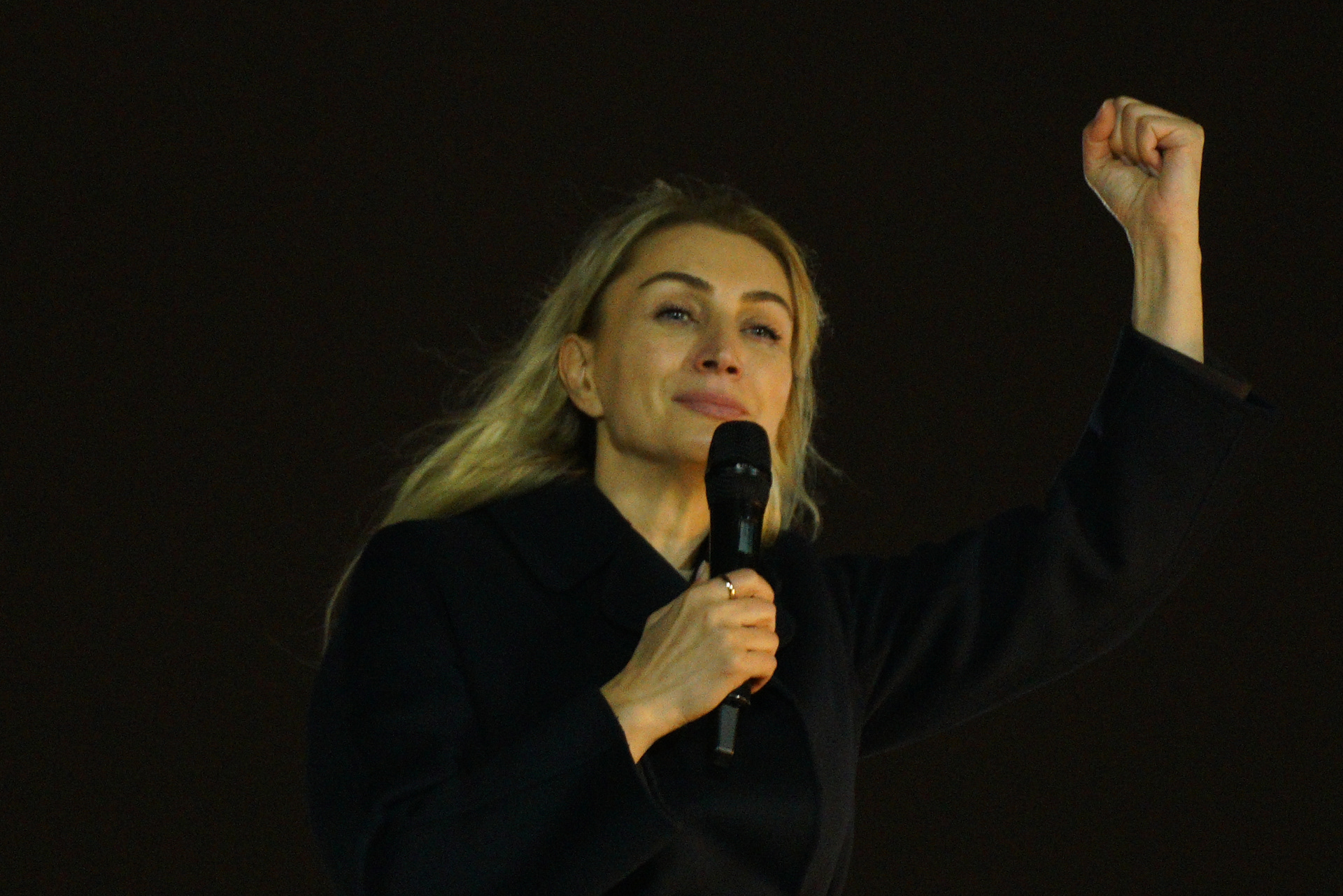 Dilek Imamoglu, wife of Istanbul Mayor Ekrem Imamoglu, gestures, as supporters of Istanbul Mayor Ekrem Imamoglu gather outside the Istanbul Metropolitan Municipality building during a rally to protest the first anniversary of the arrest of Istanbul Mayor Ekrem Imamoglu, the mayor of Istanbul in Istanbul, Turkey on March 18, 2026.