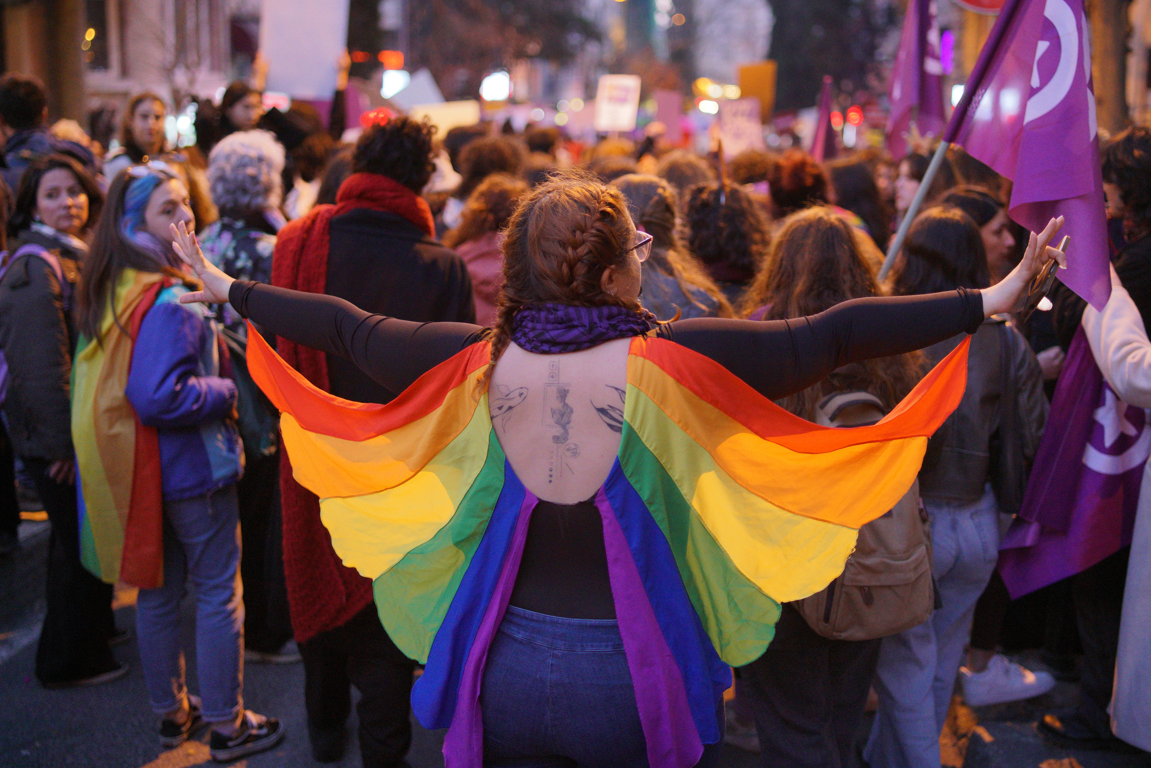 A supporter of the LGBT community wears angel wings with rainbow colors during a rally on the occasion of the International Women's Day in Istanbul, Turkey on March 8, 2025.