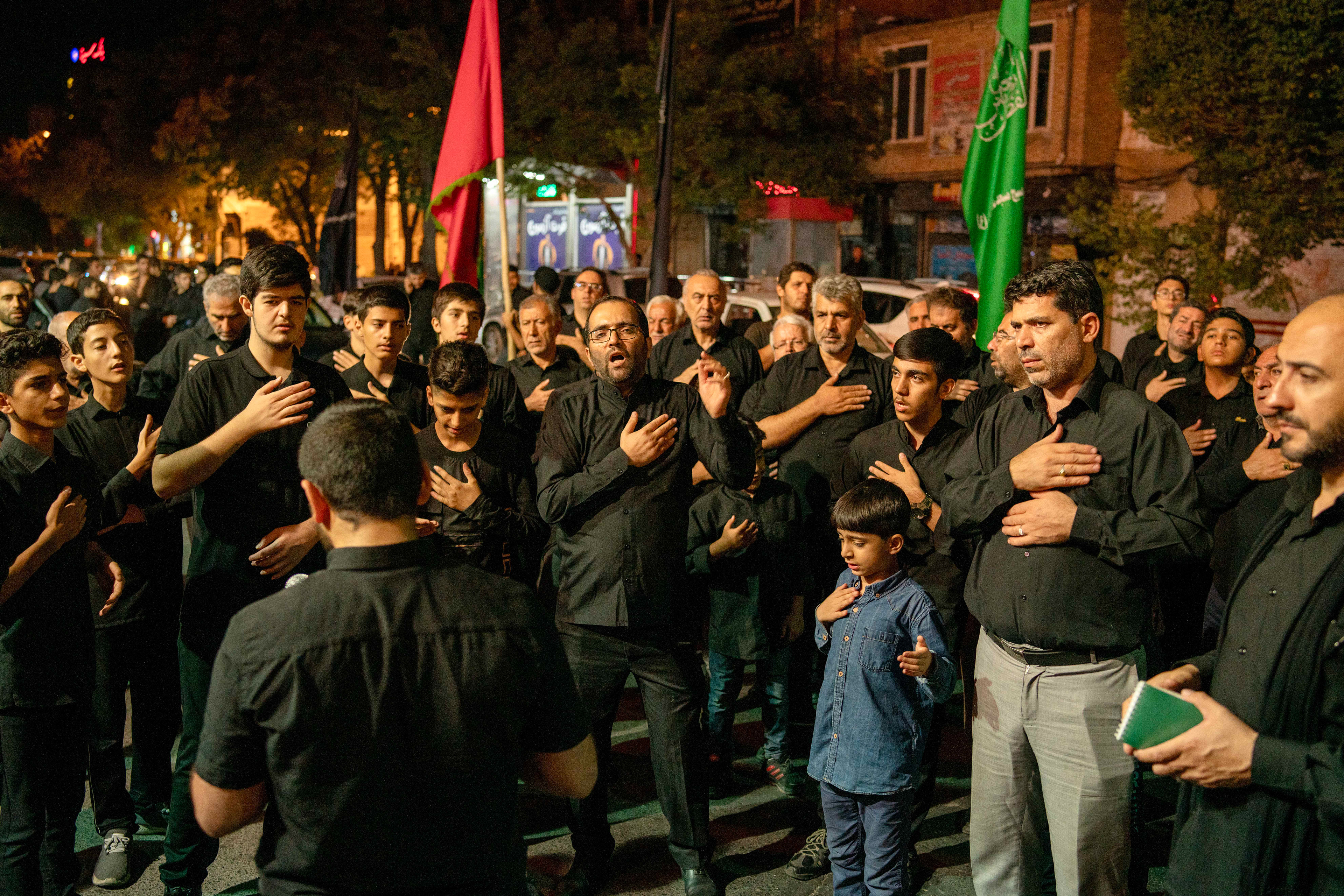 Shiite Muslims in Tabriz, Iran on July 27, 2023, sing hymns in small groups called 'deste' at the Tasua commemoration, the day before Asura Day, the 1384th anniversary of the martyrdom of Imam Hussein, the grandson of the Islamic Prophet Muhammad.