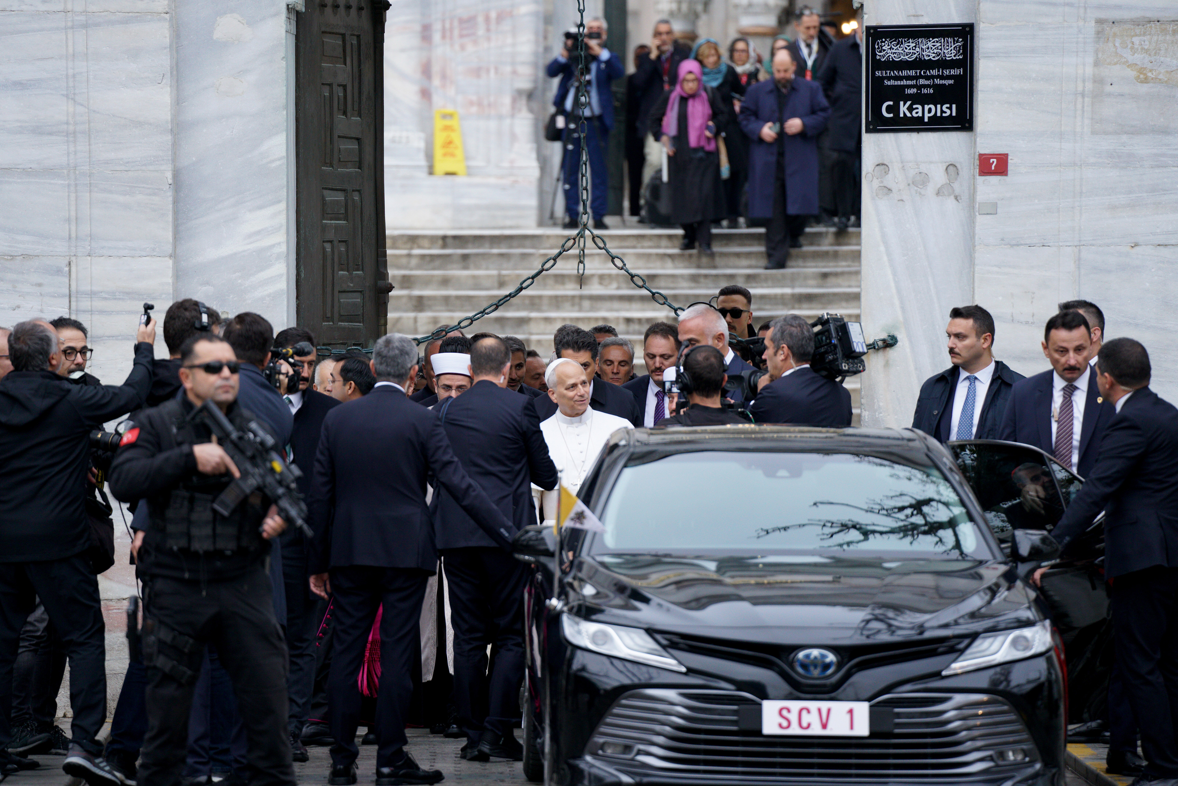 Pope Leo XIV leaving Ottoman-era Sultanahmet Mosque, known as the Blue Mosque, during his first apostolic journey, in Istanbul on November 29, 2025.
