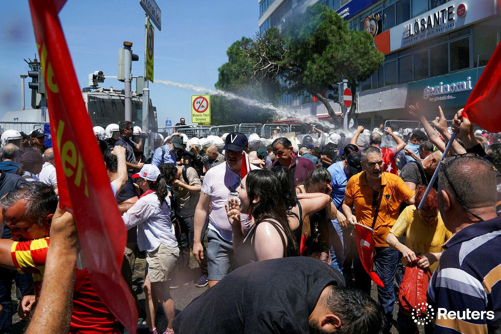 Police use a water cannon during a rally to disperse supporters of Ozgur Ozel, the ousted chairman of the main opposition Republican People’s Party (CHP), while waiting for his arrival in Izmir, Turkey, May 26, 2026. 