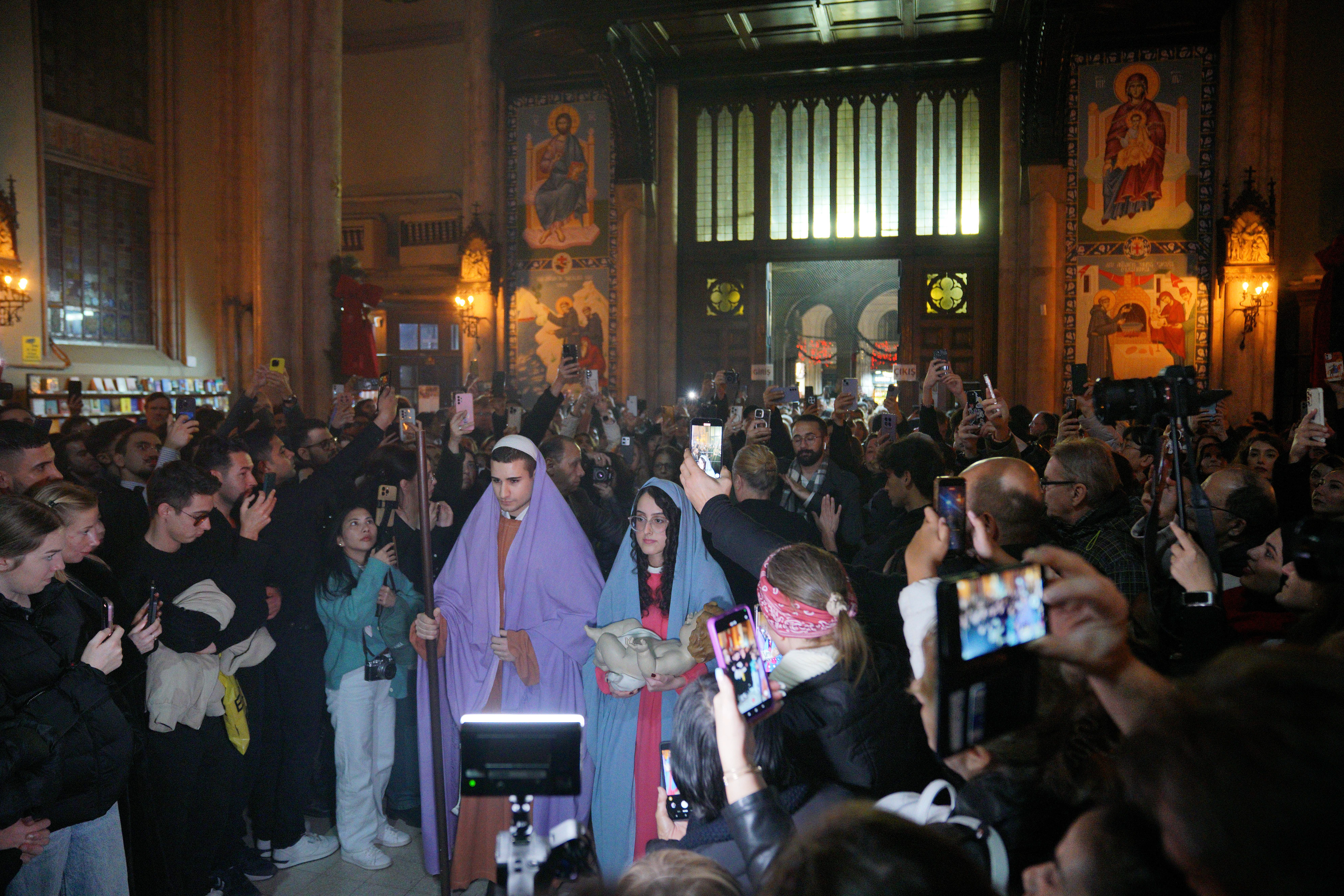 People attend a Christmas Eve service at the St. Antuan Catholic Church, in Istanbul, Turkey, December 24, 2025.
