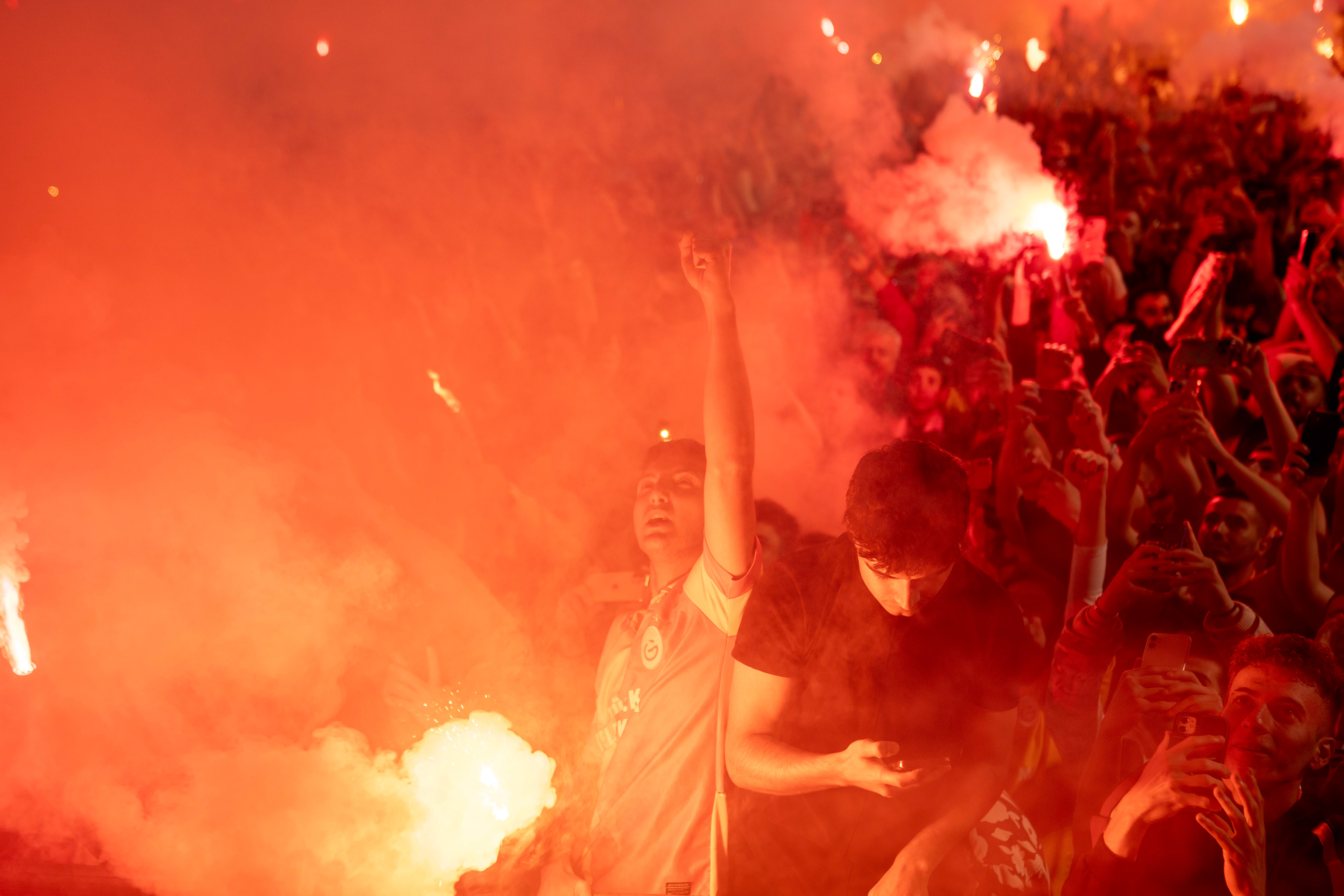 Fans of Galatasaray celebrate their club won the 24th Turkish league title victory, at Metin Oktay Sports Complex and Training Center, in Florya, Istanbul on May 27, 2024. 