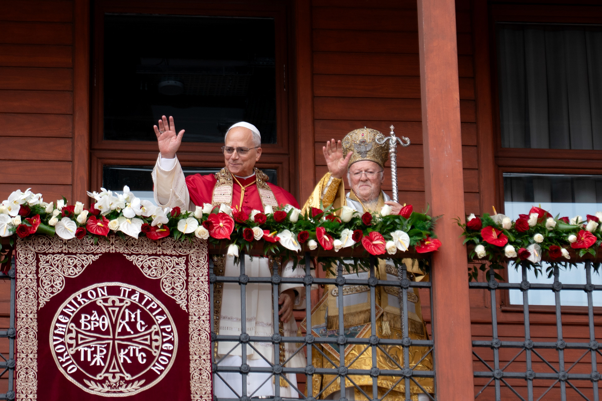 Pope Leo XIV and Ecumenical Patriarch Bartholomew I wave as they deliver an ecumenical blessing at the conclusion of a joint Christian prayer service, at the Patriarchal Church of St. George, during his first apostolic journey, in Istanbul, Turkey, November 30, 2025.