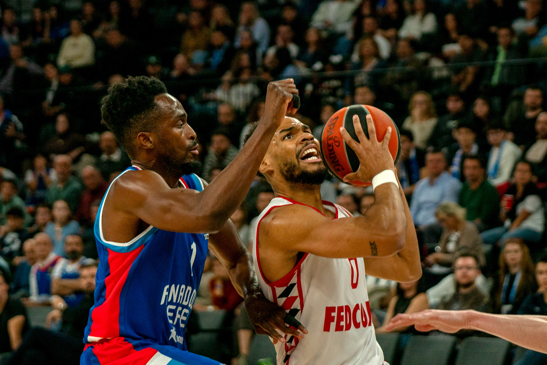 Rodrigue Beaubois (R) of Anadolu Efes in action against Elie Okobo (L) of Monaco during the EuroLeague during the EuroLeague Basketball match between Anadolu Efes vs Monaco in Istanbul, Turkey on November 8 2024.