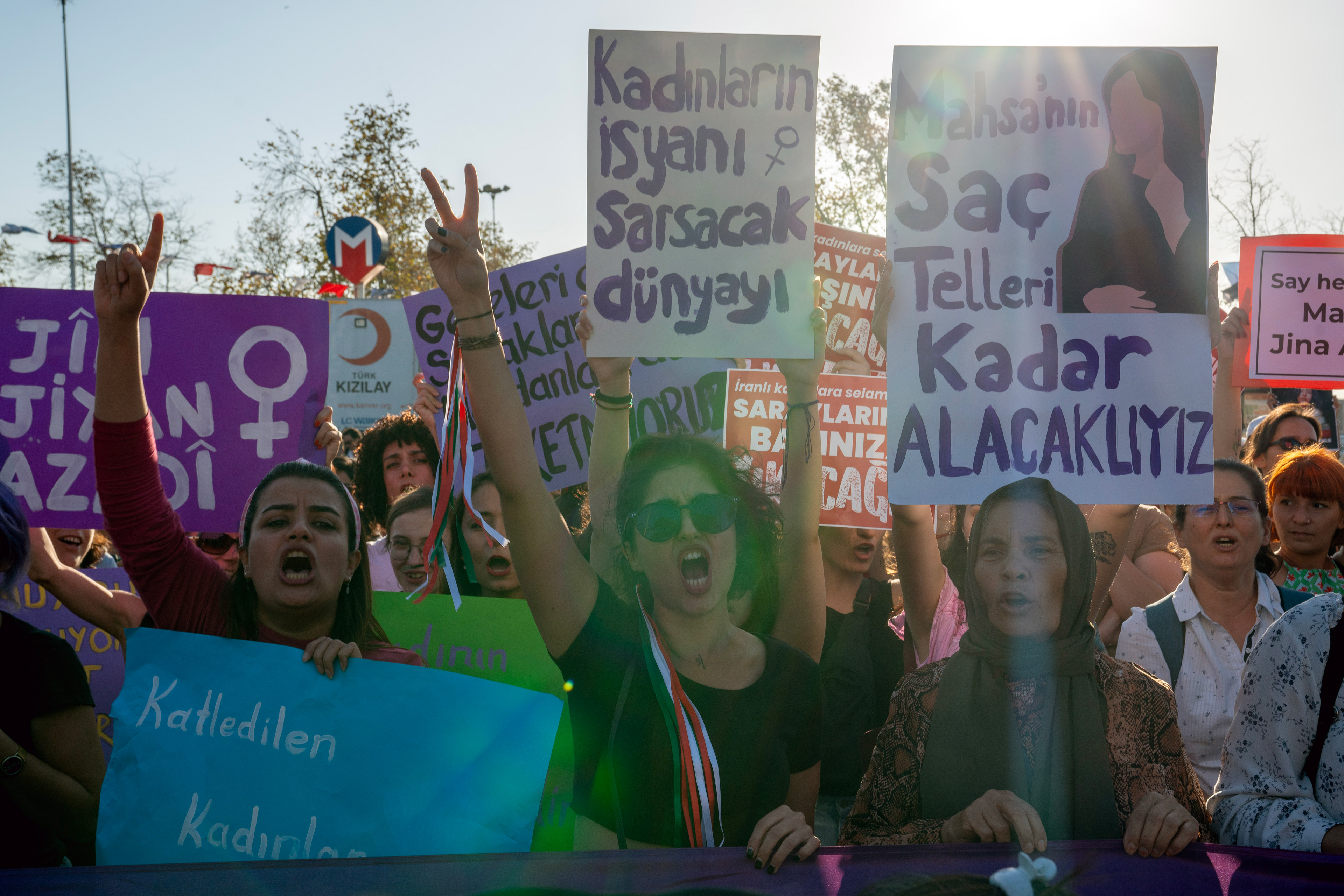 Women shout slogans at the rally held in Istanbul on the anniversary of Mahsa Amini's death on September 16, 2023. 