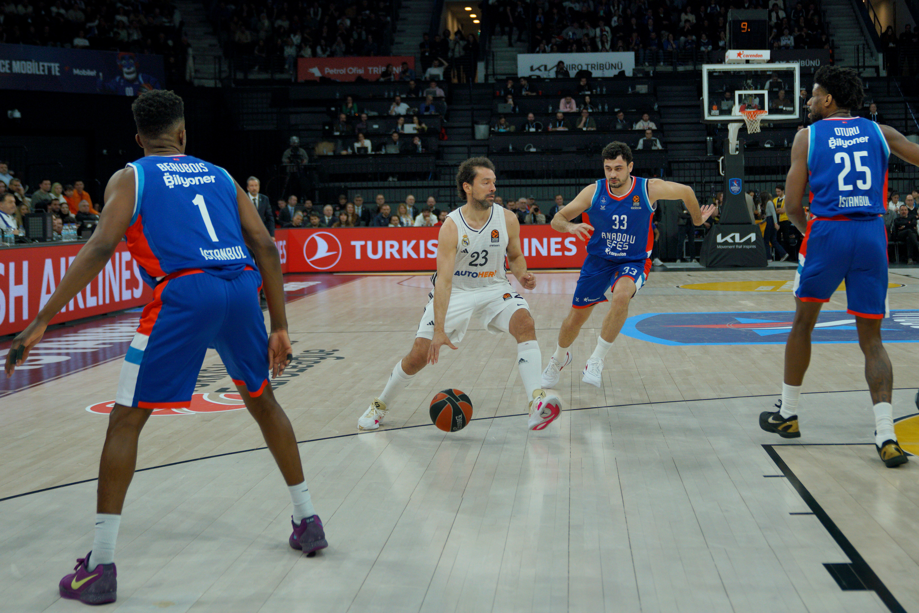 Erkan Yilmaz (C-R) of Anadolu Efes in action against Sergio Llull (C-L) of Real Madrid during the EuroLeague Basketball match between Anadolu Efes vs Real Madrid in Istanbul, Turkey on February 4, 2025.