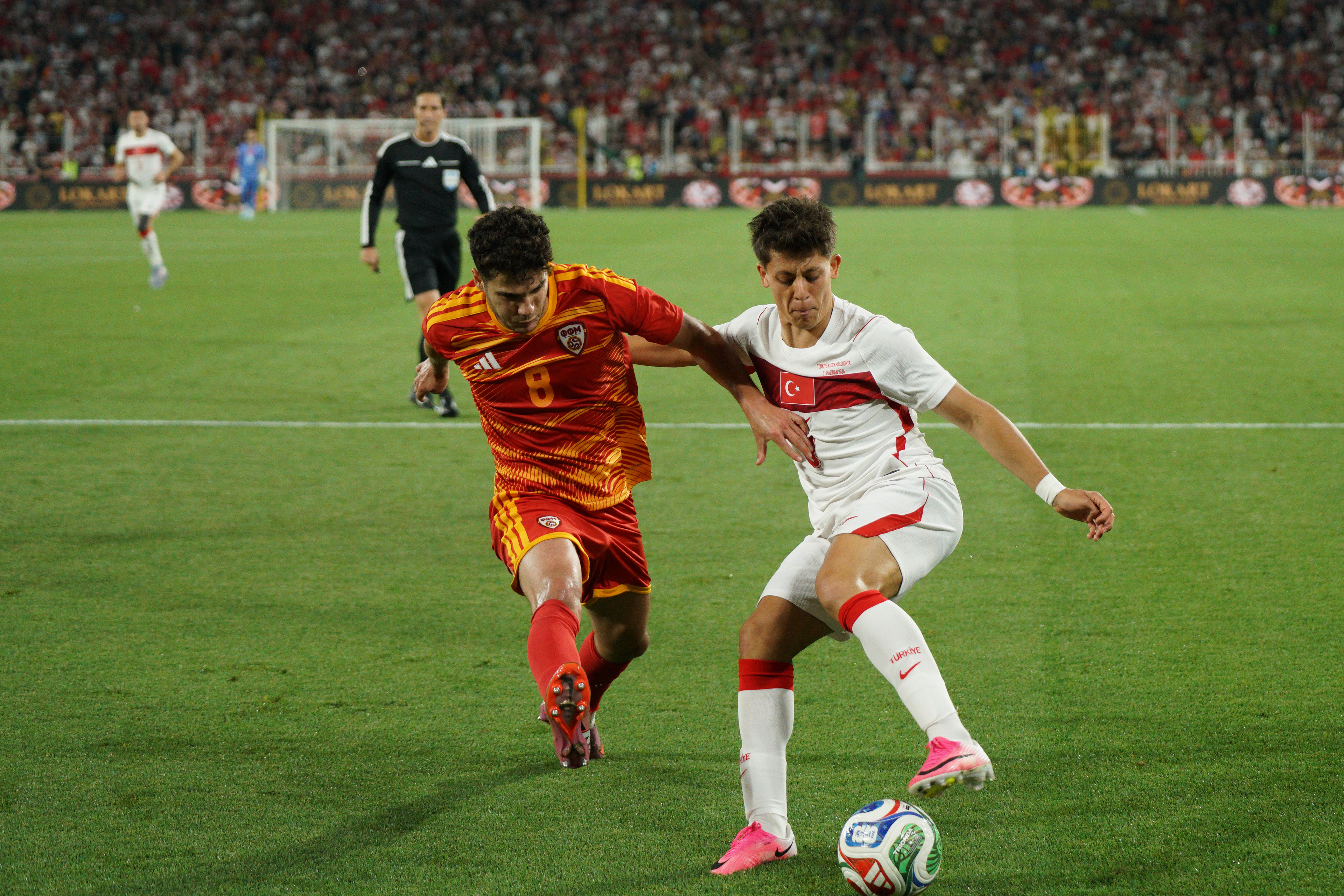 Arda Guler (R) of Turkey in action against Agon Elezi (L) of North Macedonia during the Turkey-North Macedonia match at Fenerbahce Sukru Saracoglu Stadium in Istanbul on June 1, 2026, as part of the preparations for the 2026 FIFA World Cup.