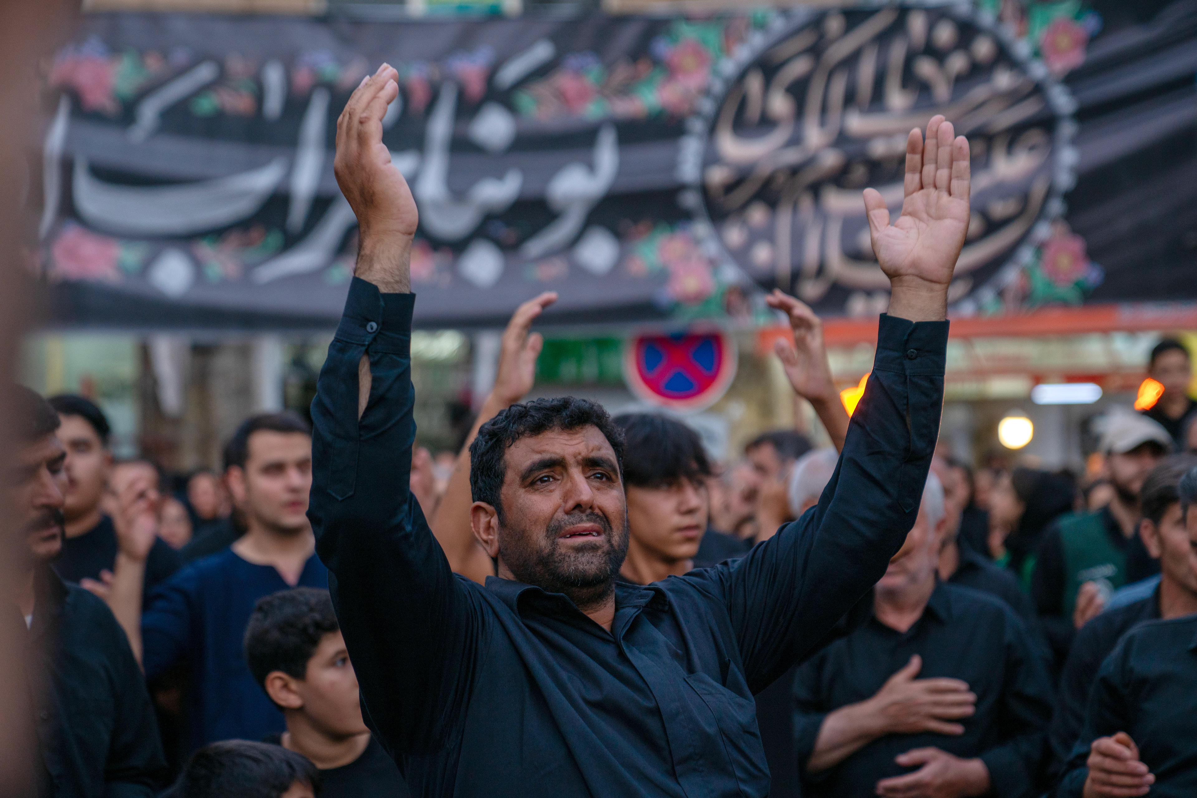 A man reacts, at commemorations in Enghelab Square, Zanjan, Iran, on July 29, 2023, the day after the Day of Ashura, the 1384th anniversary of the martyrdom of Imam Hussein, the grandson of the Islamic Prophet Muhammad.