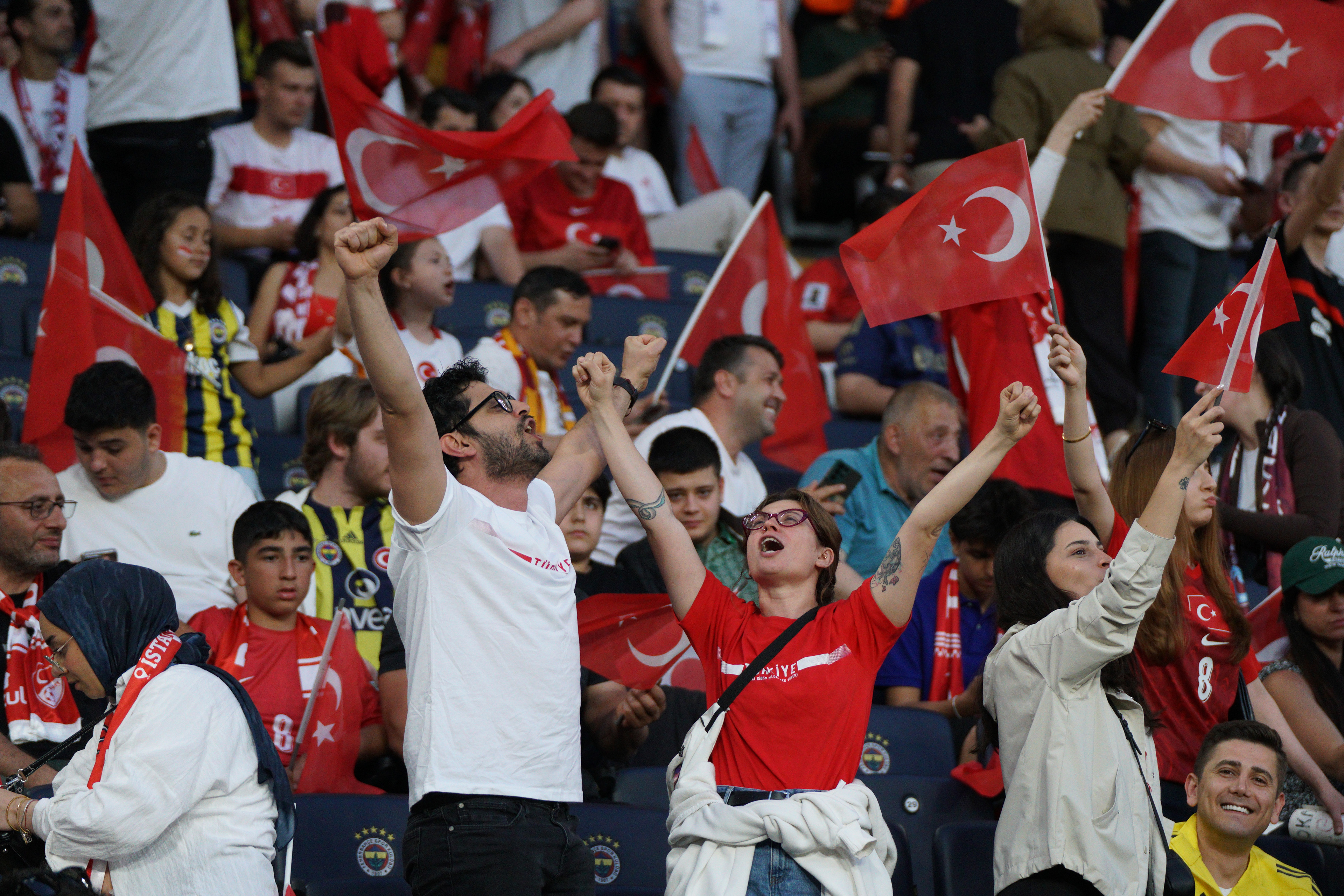 Turkish national team fans chant slogans and wave Turkish flags ahead of the Turkey-North Macedonia match, to be played at Fenerbahce Sukru Saracoglu Stadium in Istanbul on June 1, 2026, as part of the preparations for the 2026 FIFA World Cup.