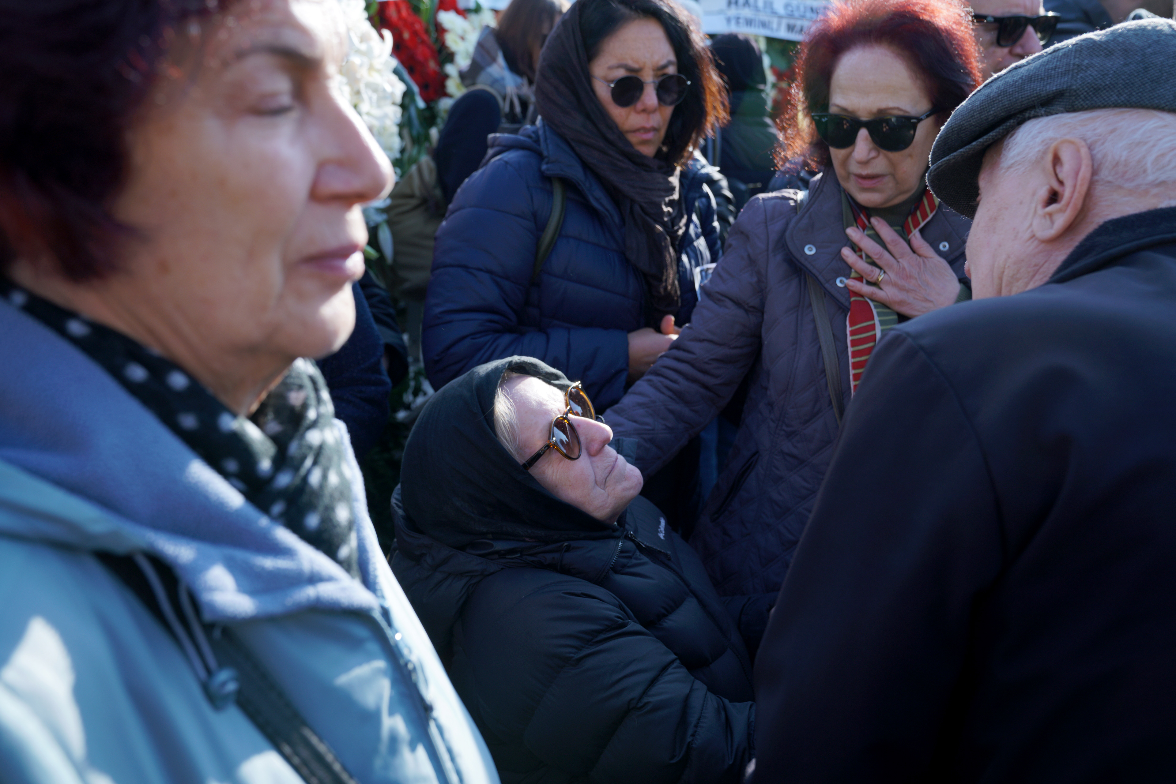 Meral Yilmazer (C), mother-in-law of Turkish journalist Nedim Turkmen, mourns during Nedim and his family's funeral in Istanbul, Turkey, 22 January 2025.