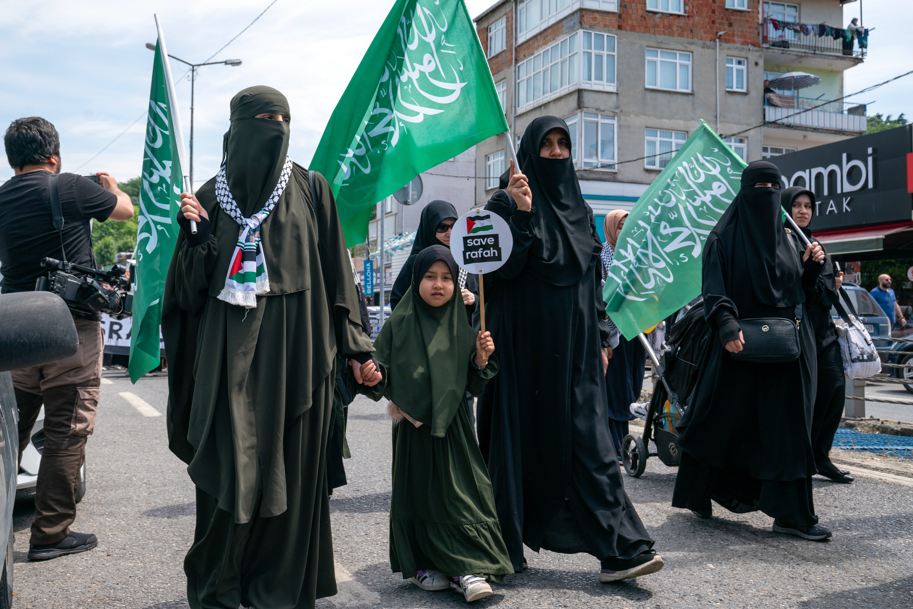 Protestors shout slogans during a pro-Palestine march from Istinye Mahmut Cavus Mosque to US Consulate General in Istanbul on May 12, 2024.