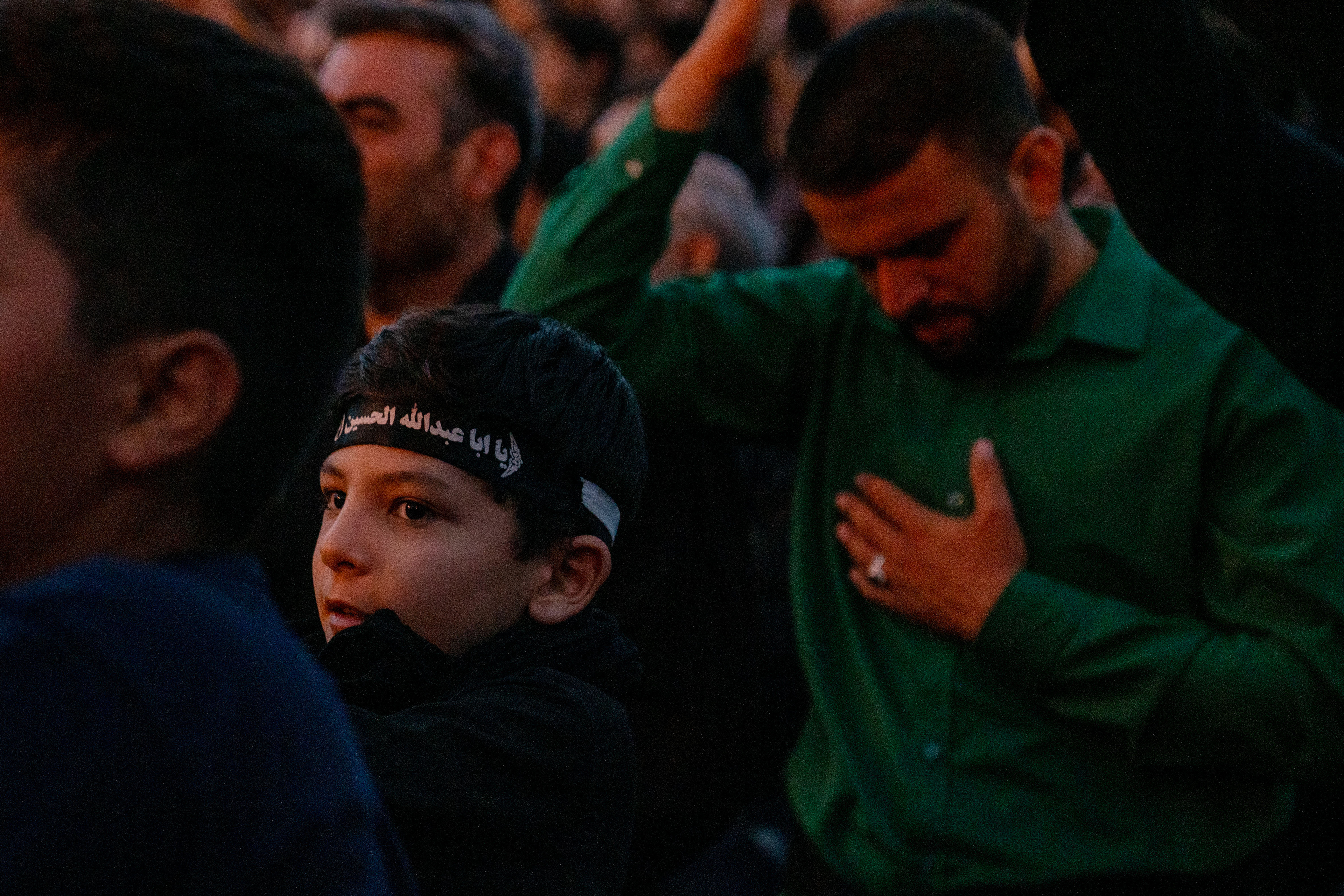 A child attends the commemoration ceremonies in Zenjan Enghelab Square, the day after the Day of Ashura, the 1384th anniversary of Imam Hussein's martyrdom.