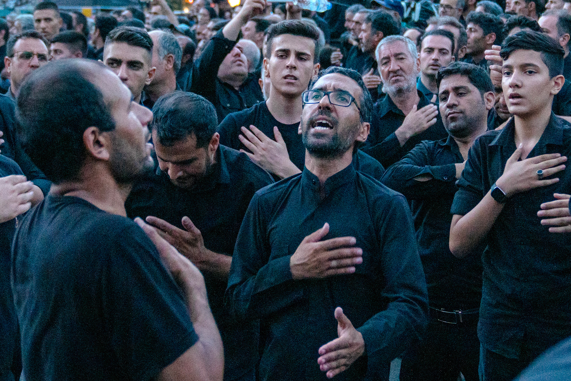 Shiite Muslims in Iran, on the day after the Day of Ashura, the 1384th anniversary of Imam Hussein's martyrdom, sing hymns in Zanjan Enghelab Square and beat themselves in a certain rhythm called 'sine vurmak'.