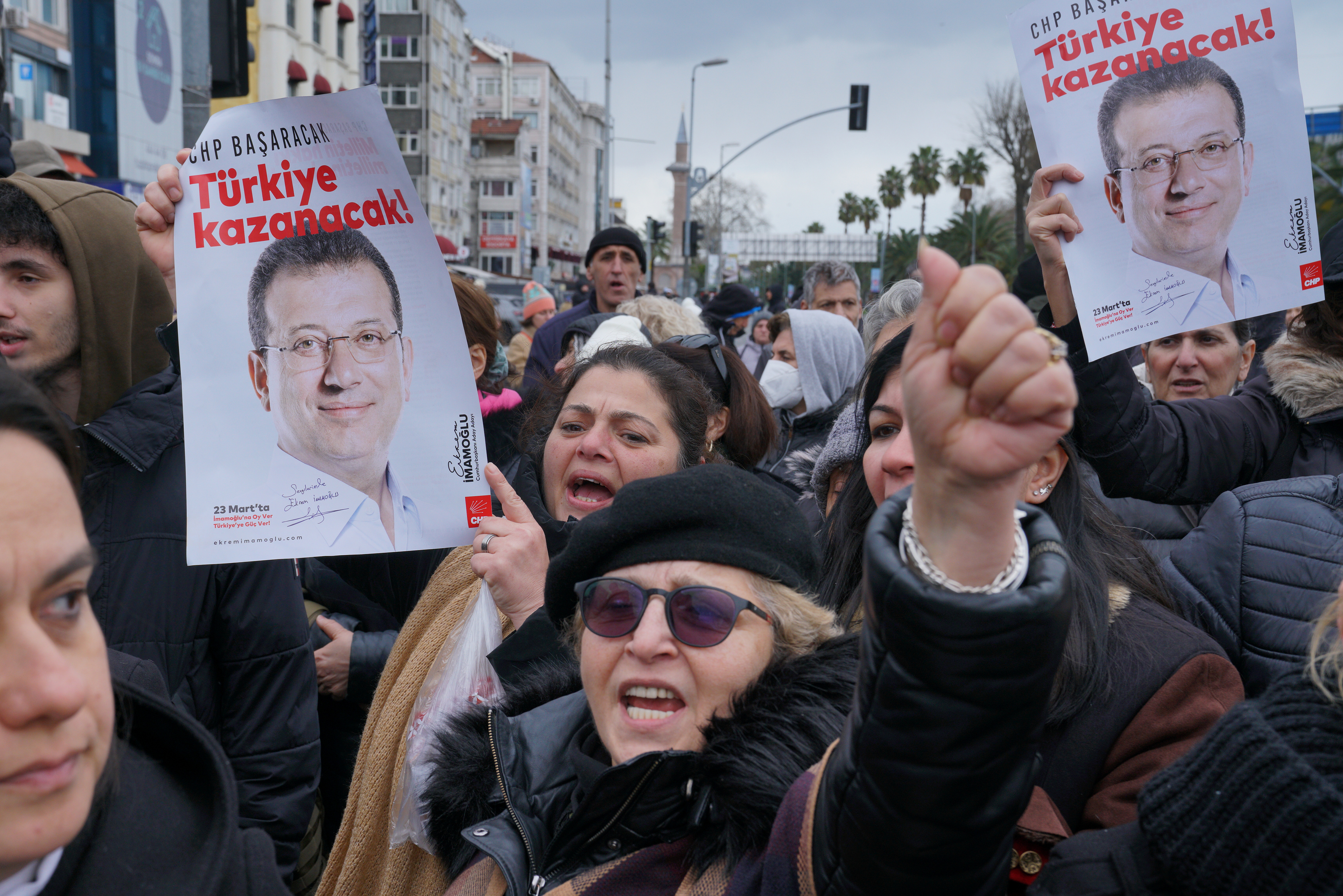 Supporters of Istanbul Mayor Ekrem Imamoglu gather near the city's police headquarters in Istanbul, Turkey, March 19, 2025. 