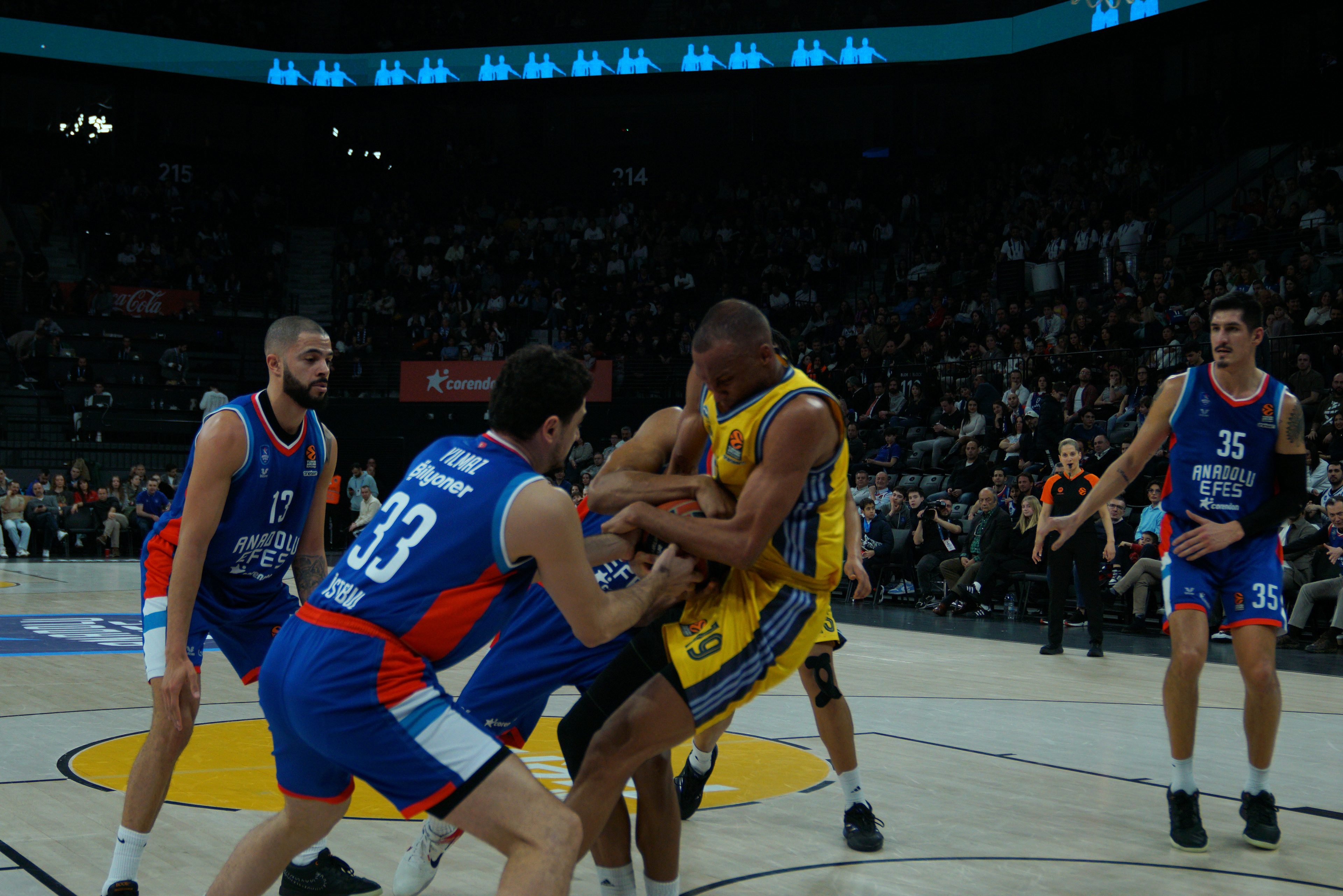 Erkan Yilmaz (L) and Perry Dozier Jr (back) of Anadolu Efes in action against Louis Olinde (C) of Alba Berlin during the EuroLeague Basketball match between Anadolu Efes vs Alba Berlin in Istanbul, Turkey on February 28, 2025.