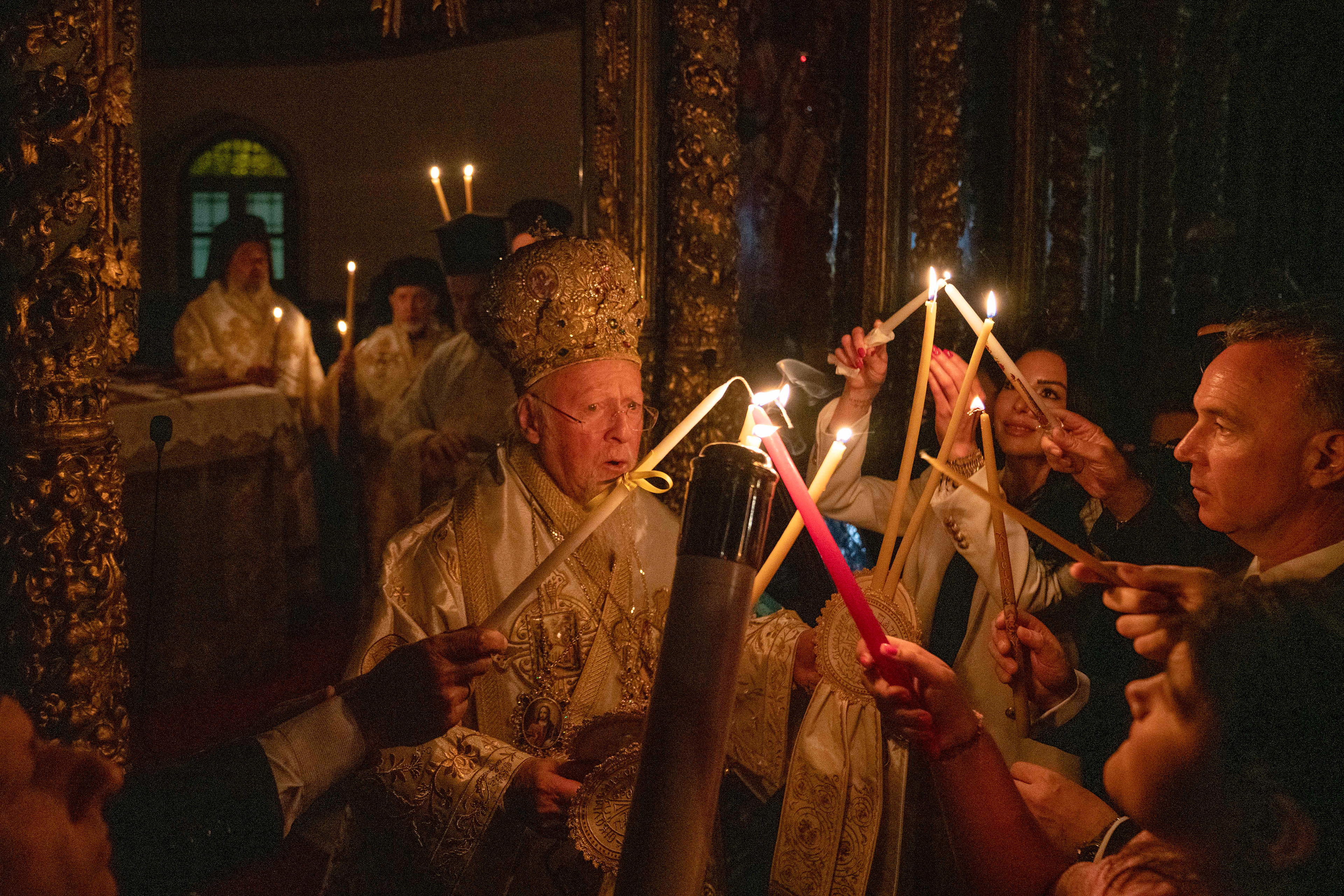 An image of Greek Orthodox Ecumenical Patriarch Bartholomew I of Constantinople ritual with the 'service of the Light',  at an Easter mass at St. George Church in Istanbul, early 5 May 2024.