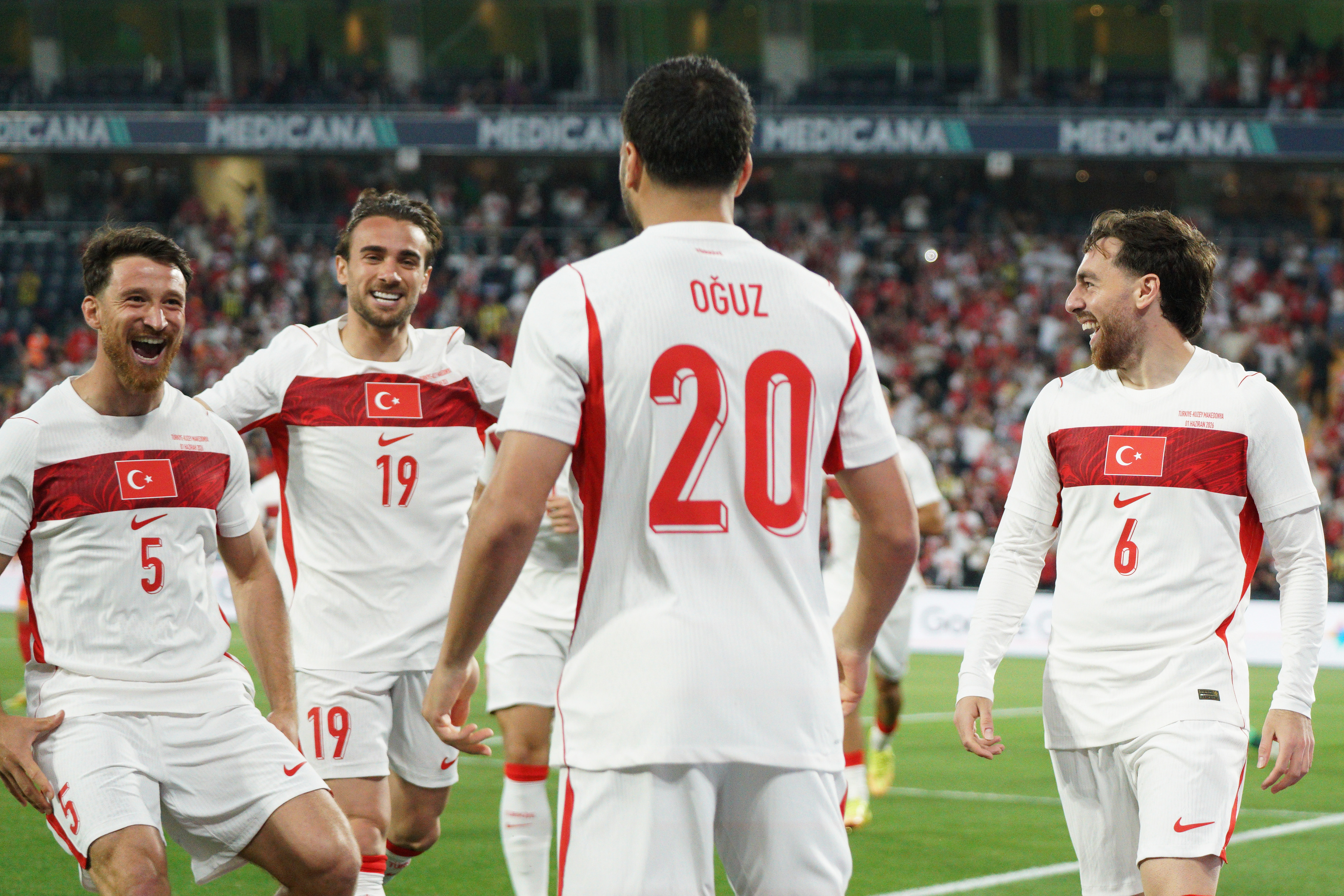 Orkun Kokcu (R) of Turkey celebrates celebrates with teammates after scoring during the Turkey-North Macedonia match at Fenerbahce Sukru Saracoglu Stadium in Istanbul on June 1, 2026, as part of the preparations for the 2026 FIFA World Cup.