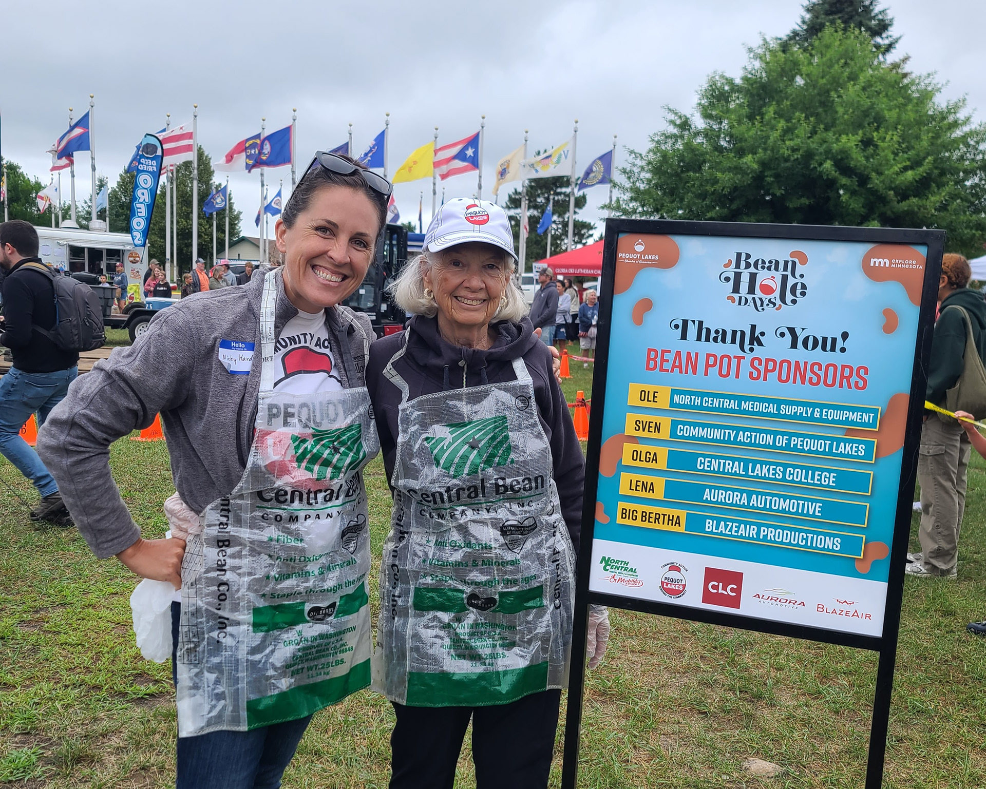 Serving Beans with Community Action of Pequot Lakes at Bean Hole Days