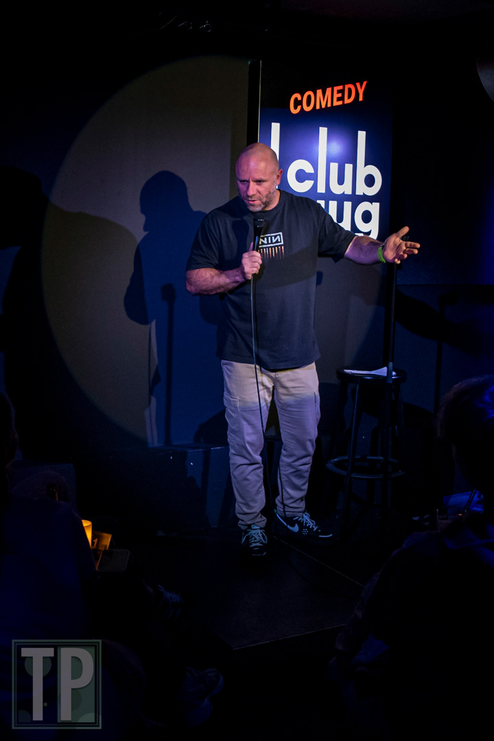 A candid portrait of comedian Jens Rabiega closing the evening of open-mic night at Comedy Club Haug in Rotterdam, the Netherlands.