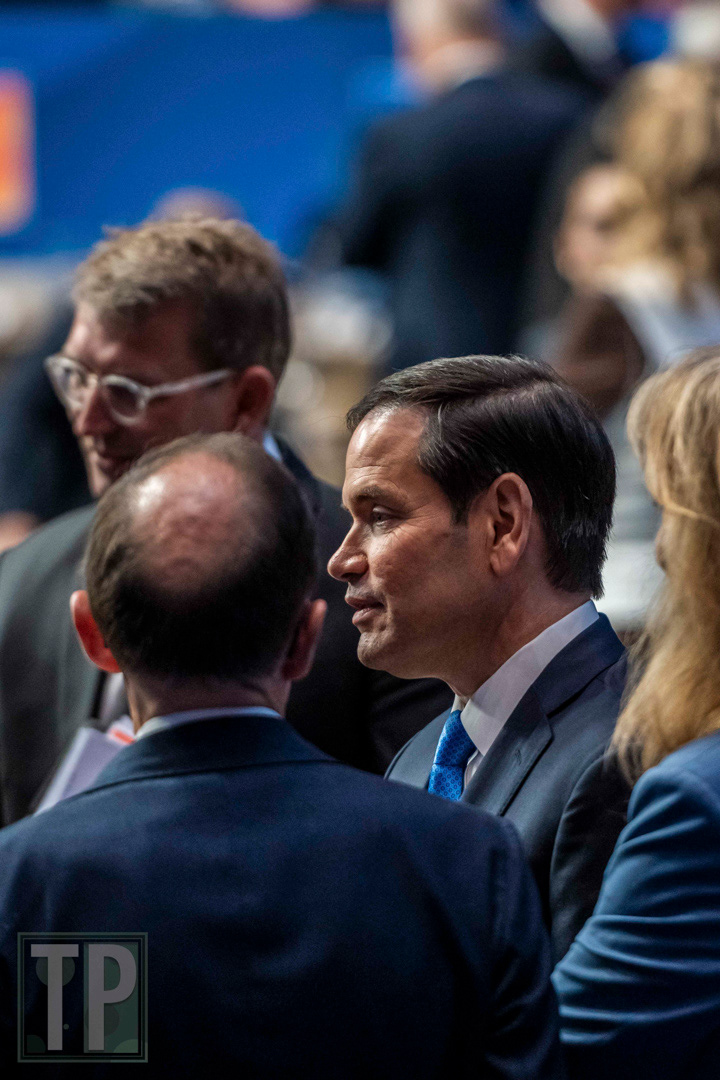 Prior to the commencement of a meeting of the North Atlantic Council, U.S. Secretary of State Marco Rubio engages in informal conversation with other participants.