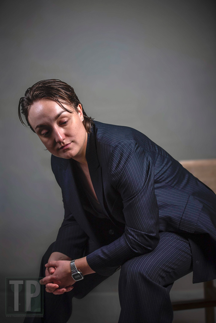 Claudia sitting relaxed for a portrait session.