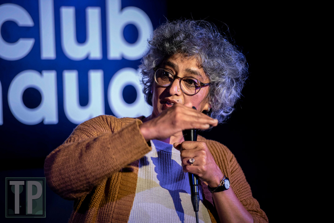 A more personal portrait shot of comedian Mohna Joshi during an English open-mic set at Comedy Club Haug in Rotterdam, the Netherlands.