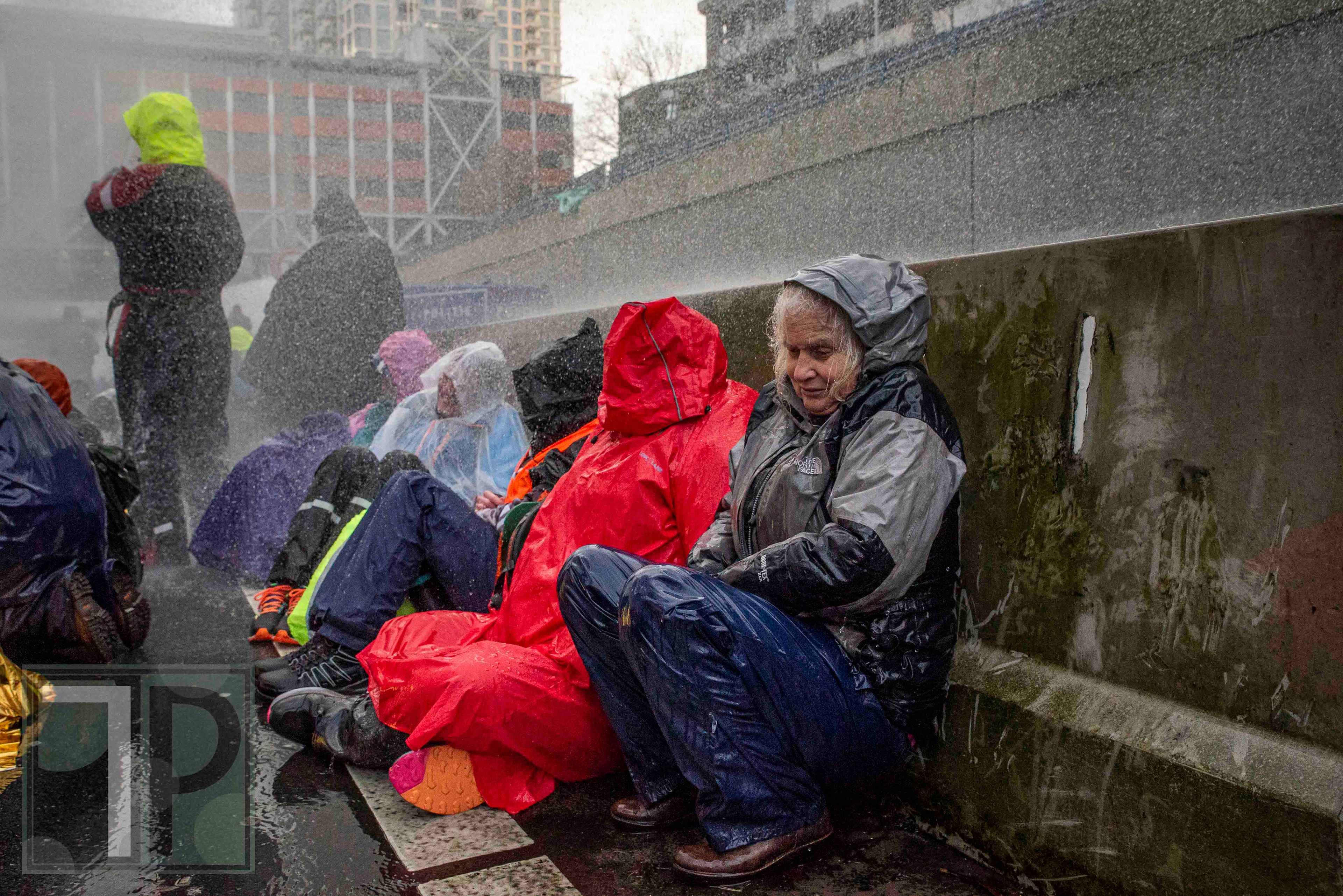 Despite the cold, Dutch police employed water cannons against the activists before arresting hundreds.