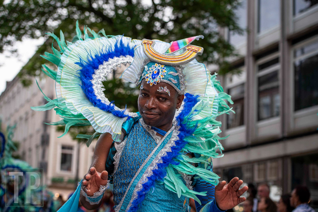 Instead, ornate and colorful costumes and drumlines pack the streets for a parade that can last up to seven hours.