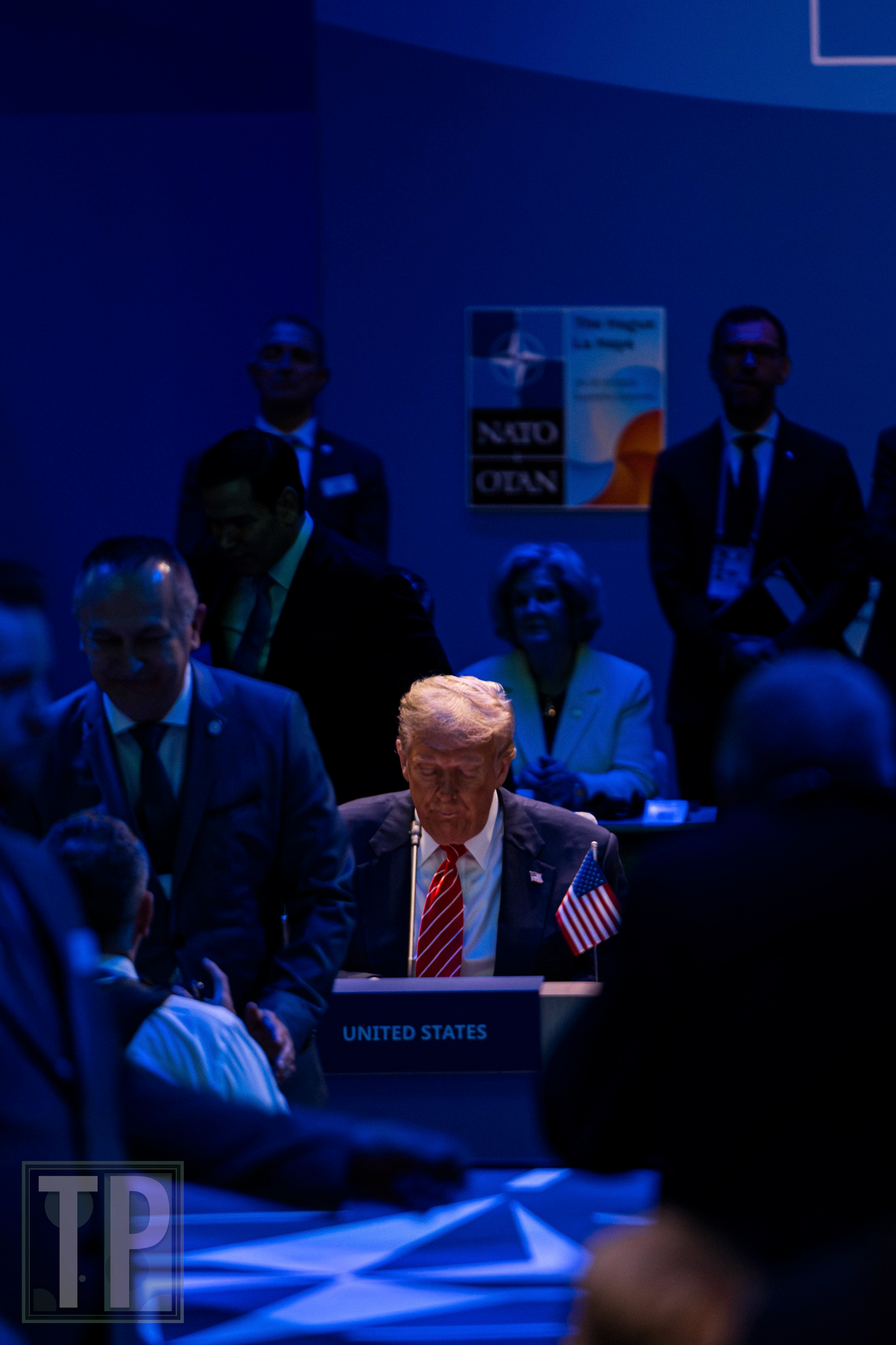 US President Donald Trump awaits the commencement of the Heads of State gathering at the North Atlantic Council meeting.