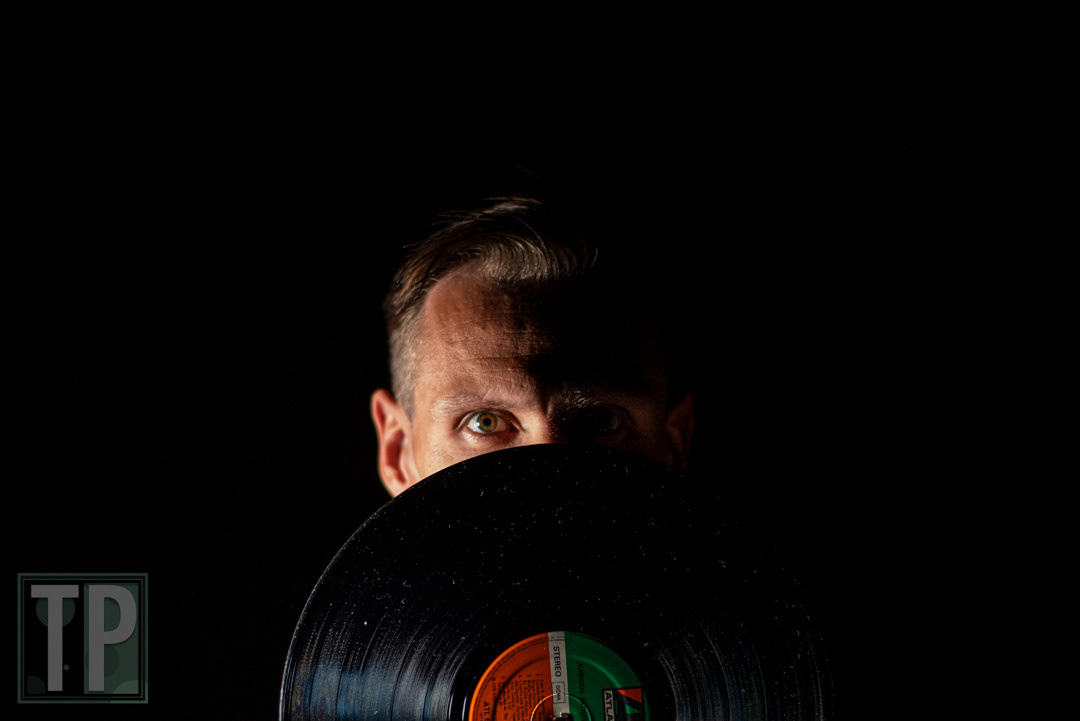 DJ De Lange posing during a studio portrait session.