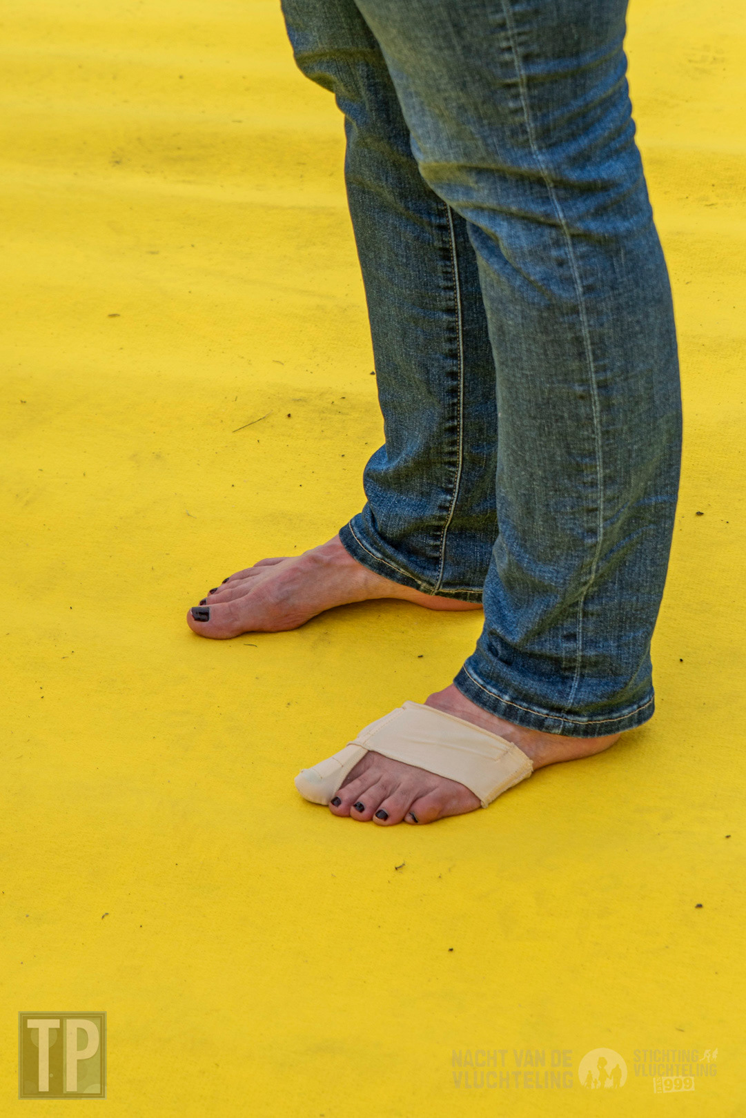 A participant’s feet are given a brief respite at the final resting point of the 40-kilometre walk of the Nacht van de Vluchteling. 