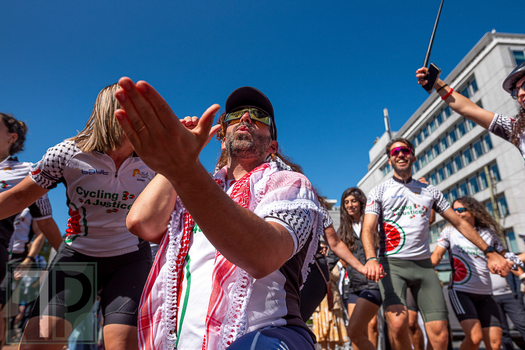 Cycling 4 Gaza participants celebrate upon completion of the 300km tour.