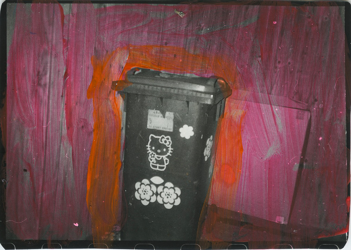 Hello Kitty Bin, Acrylic on Silver Gelatin Print, 5x7", 2023