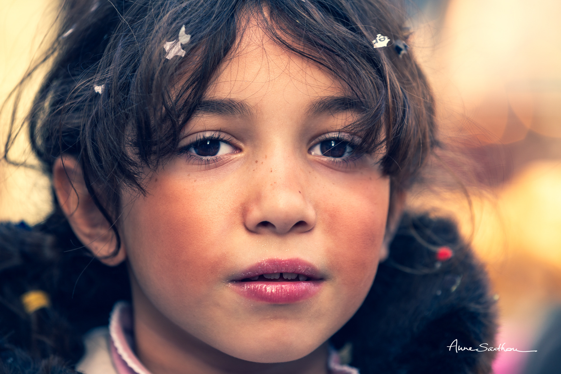 Petite fille aux couettes