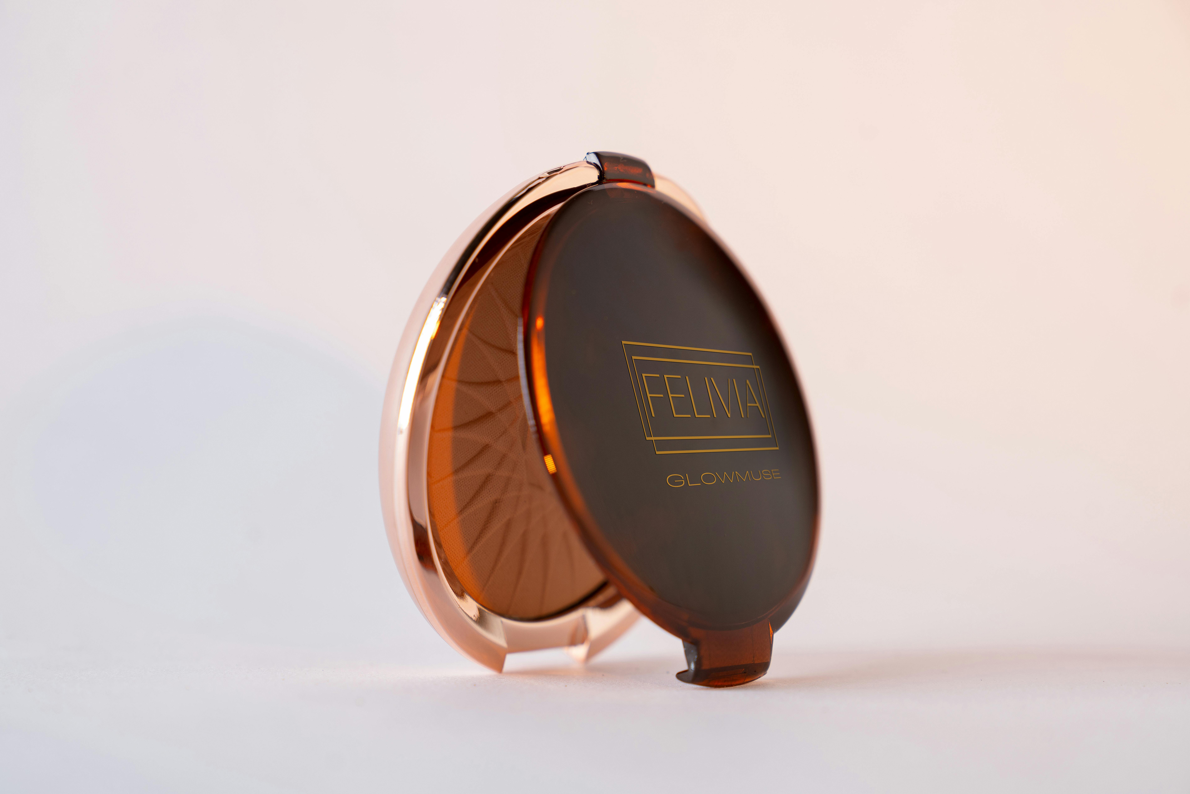 A premium compact design for Felivia's Glowbase blush, combining metallic finish with minimalist type for a sleek aesthetic.