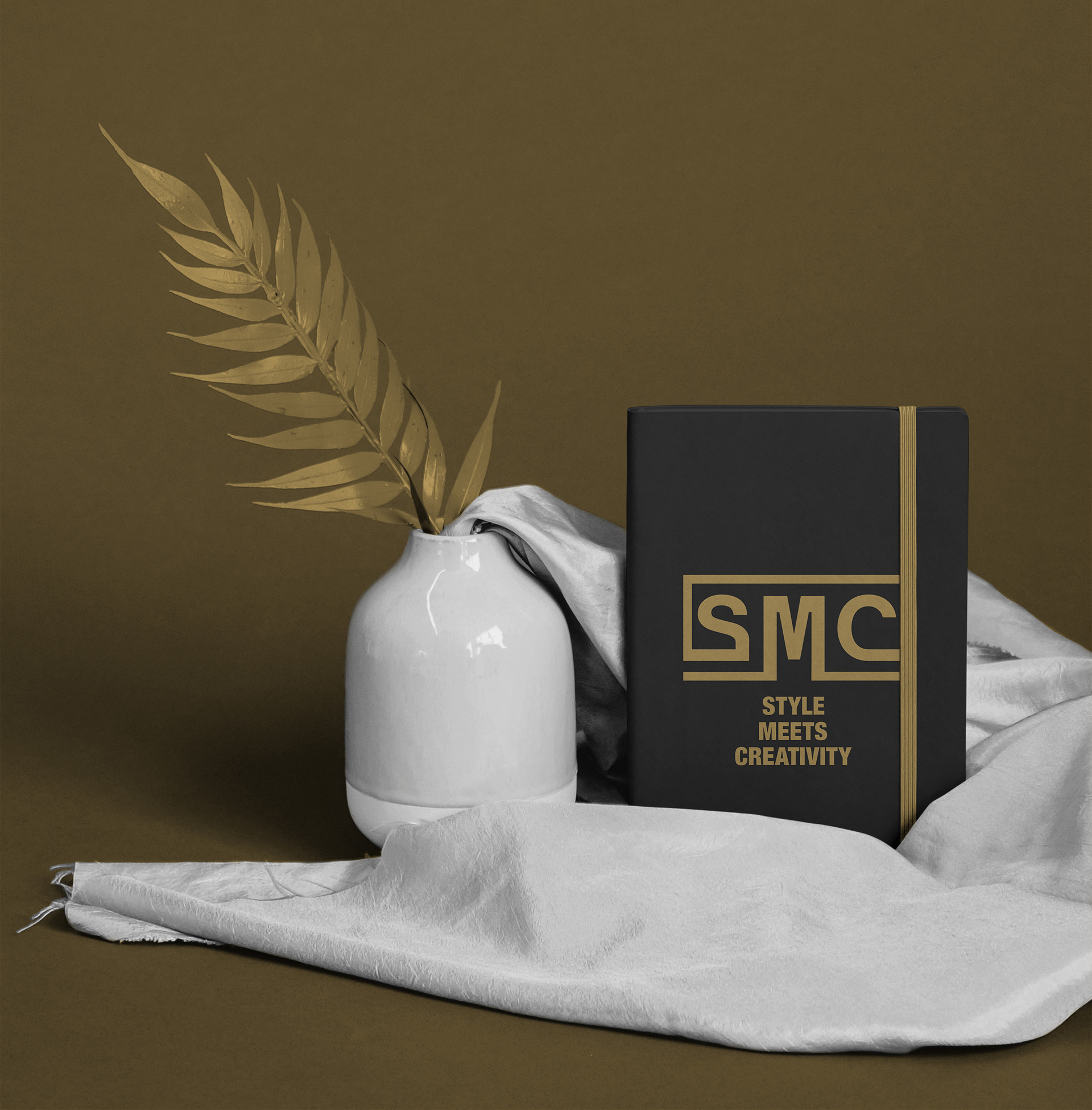 A premium notebook design that highlights the SMC brand through a minimalist composition.