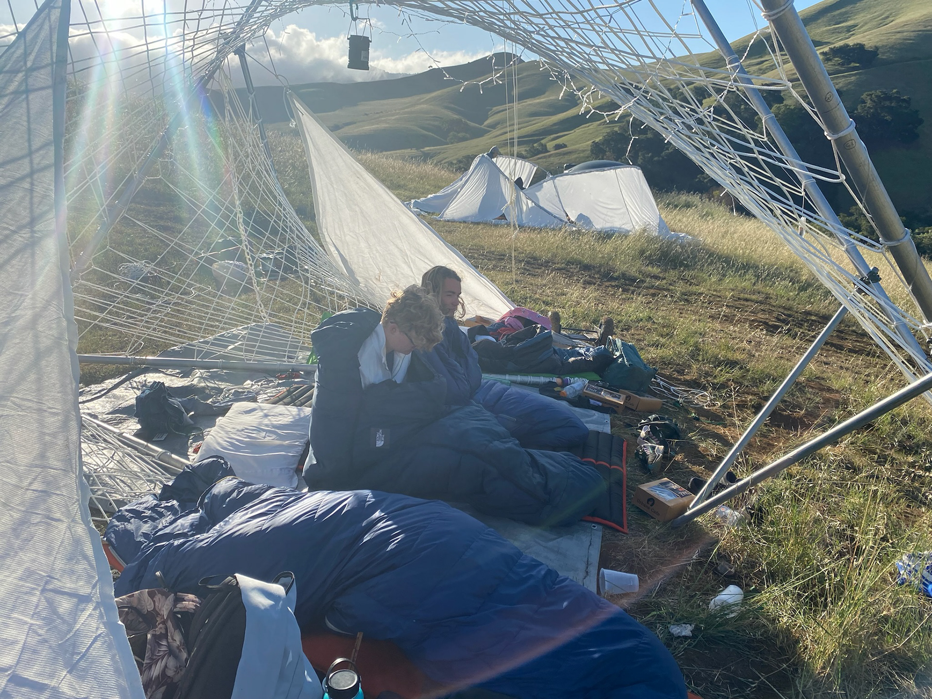 Everyone waking up the second morning in the structure.