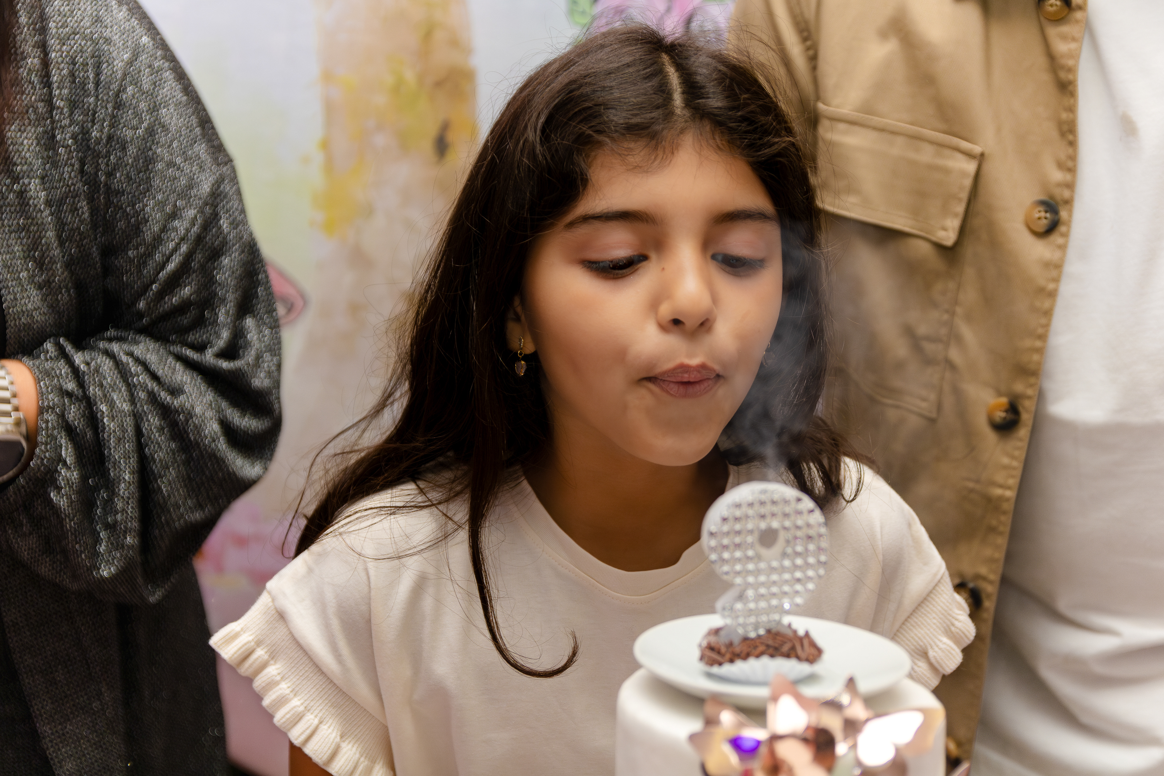 Fotografia em São Paulo, festa da Luiza., assoprando vela.