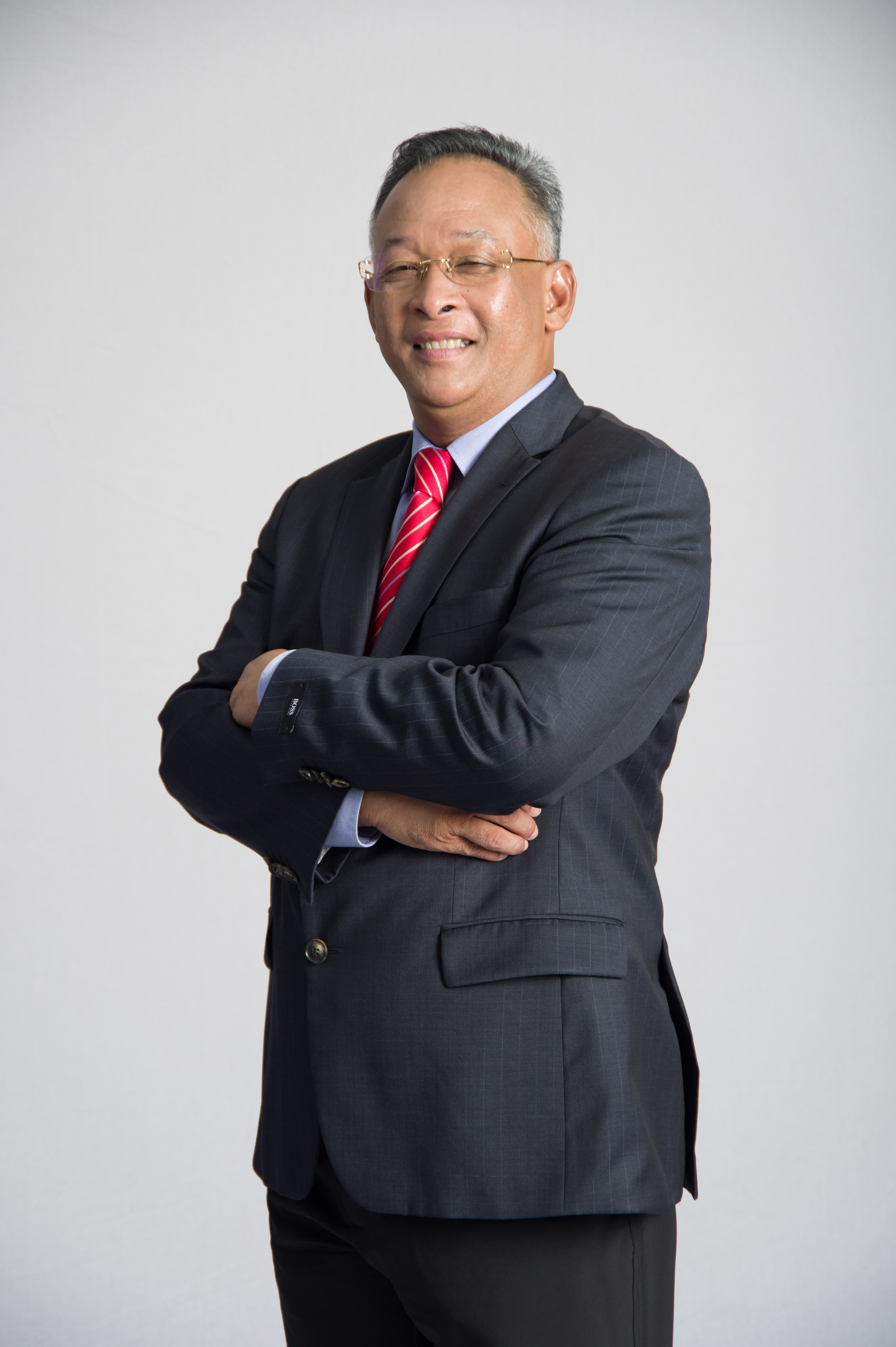 ERNESTO ADOBO, JR., Board Member