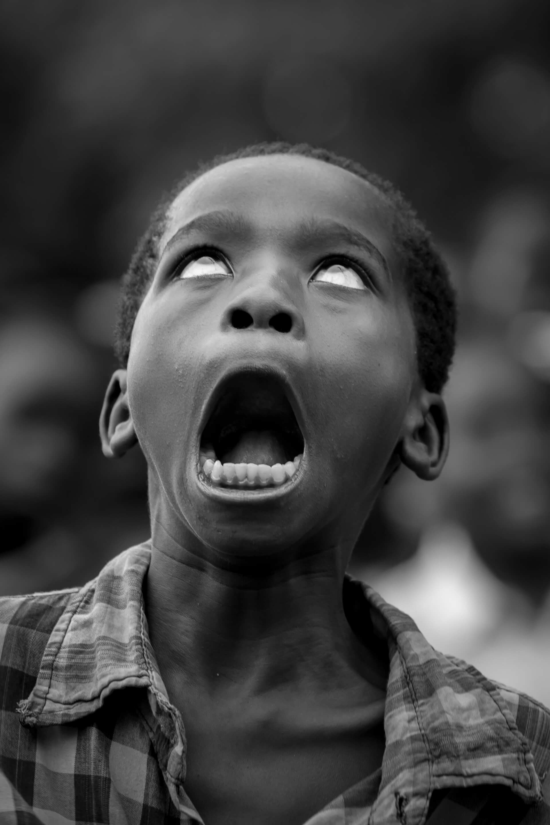Young boy in extasy during a dance contest in Vingunguti, Dar es Salaam, Tanzania