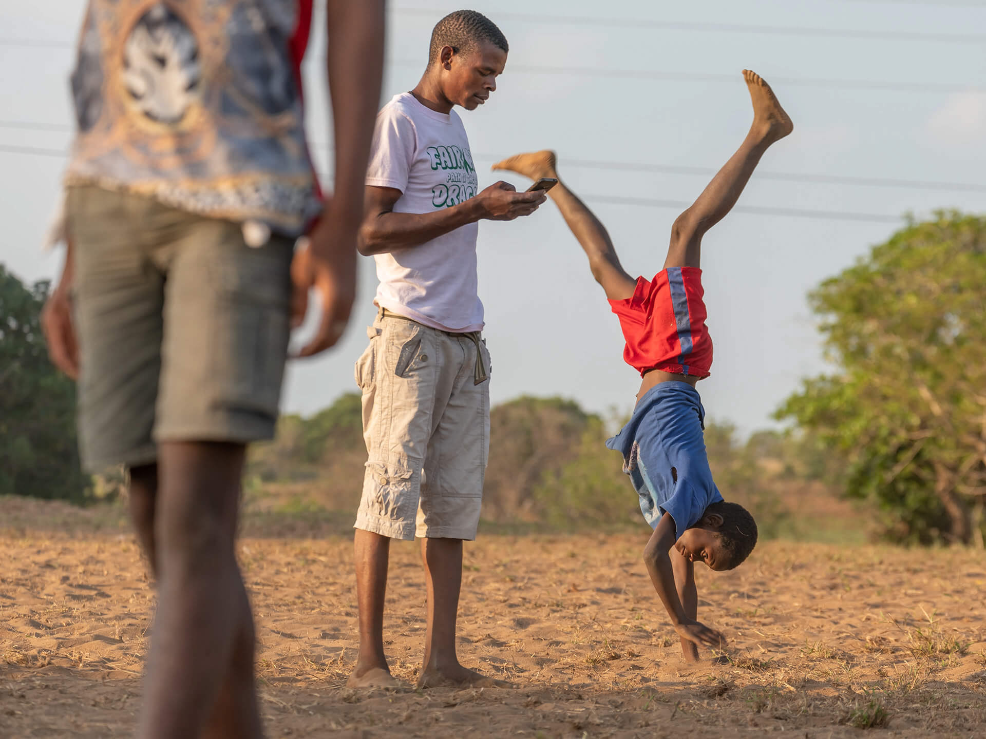 Youngsters waiting for the football game to begin at Lago Matsambe, Mozambique